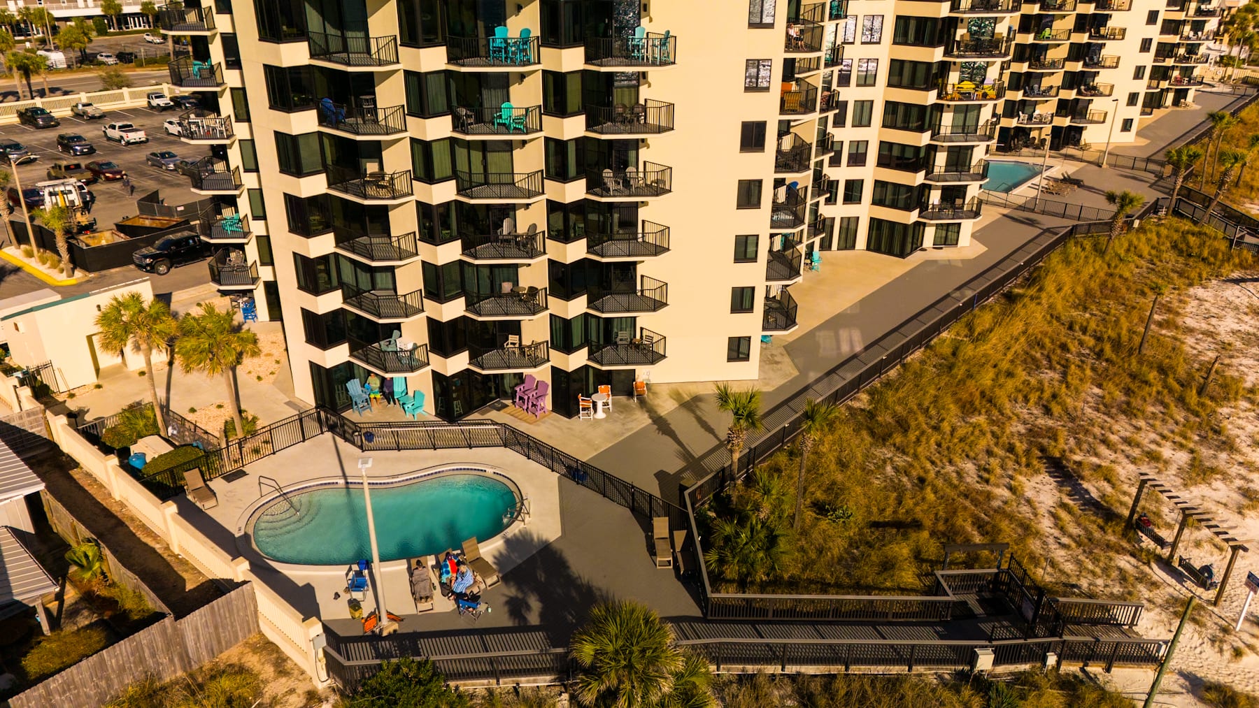 Sunbird's heated west pool w/private gated beach access.