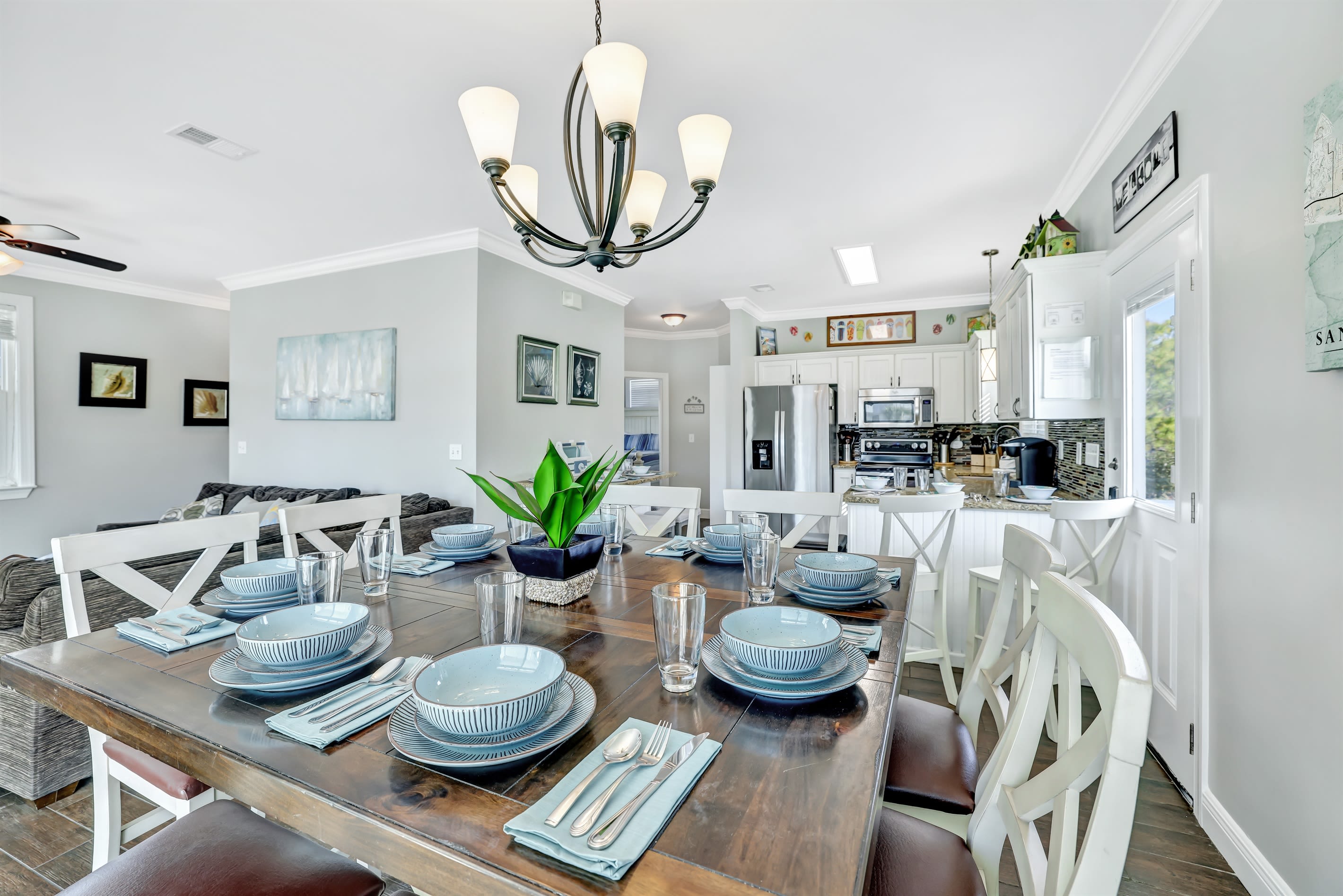 Kitchen table seating for 8 with 4+ additional seating at bar area.