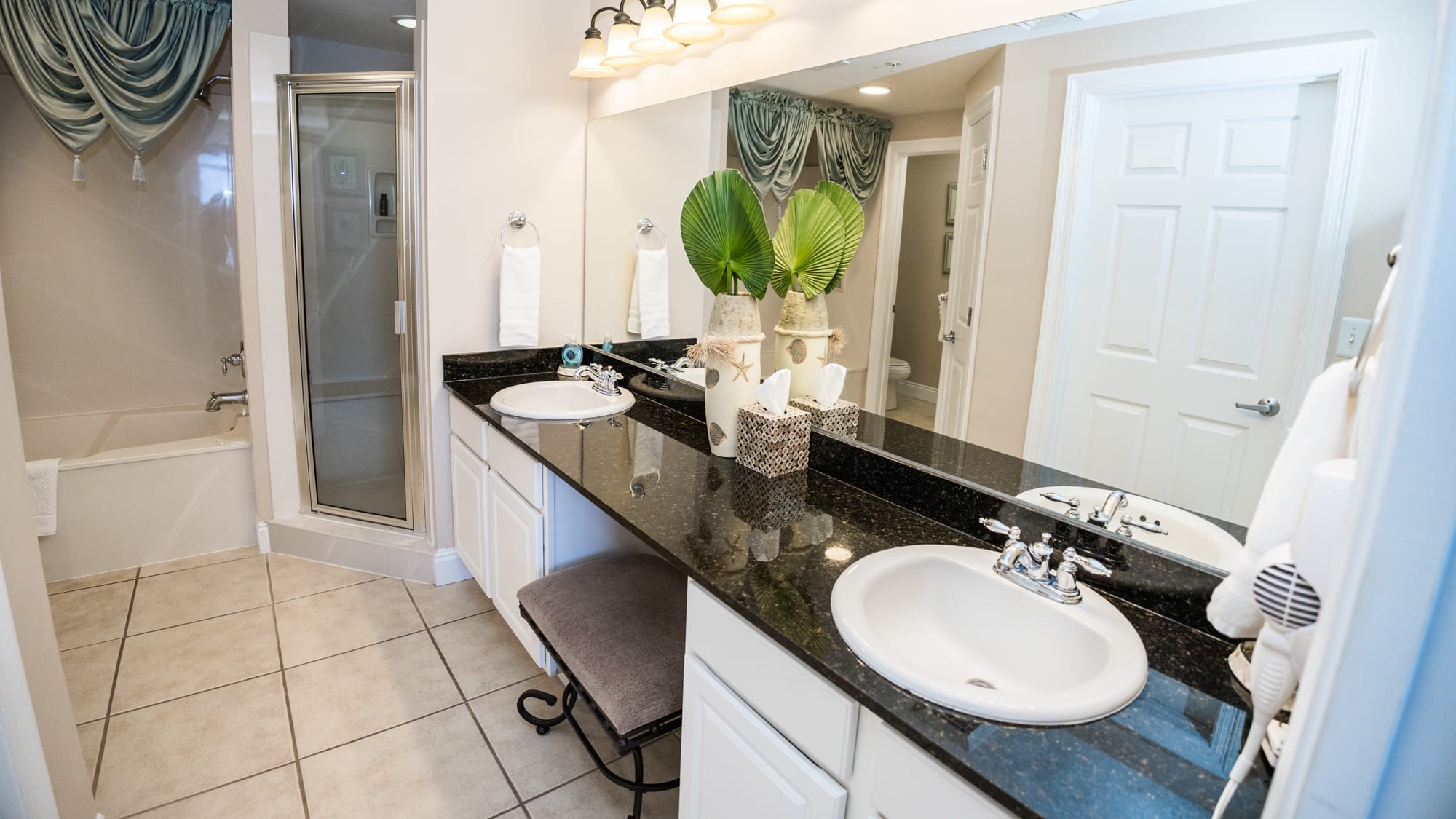 The Master Bath provides His & Hers Sinks, a vanity, a Full  Shower, & a Soaking Tub.  