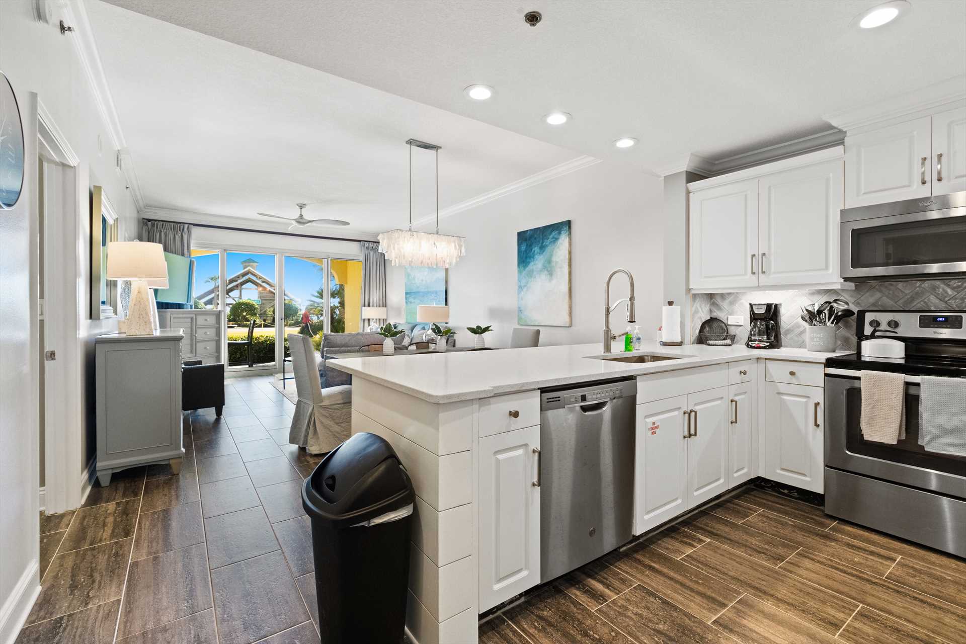 Open & Functional Layout - Enjoy easy vacation living with this kitchen-dining combo.