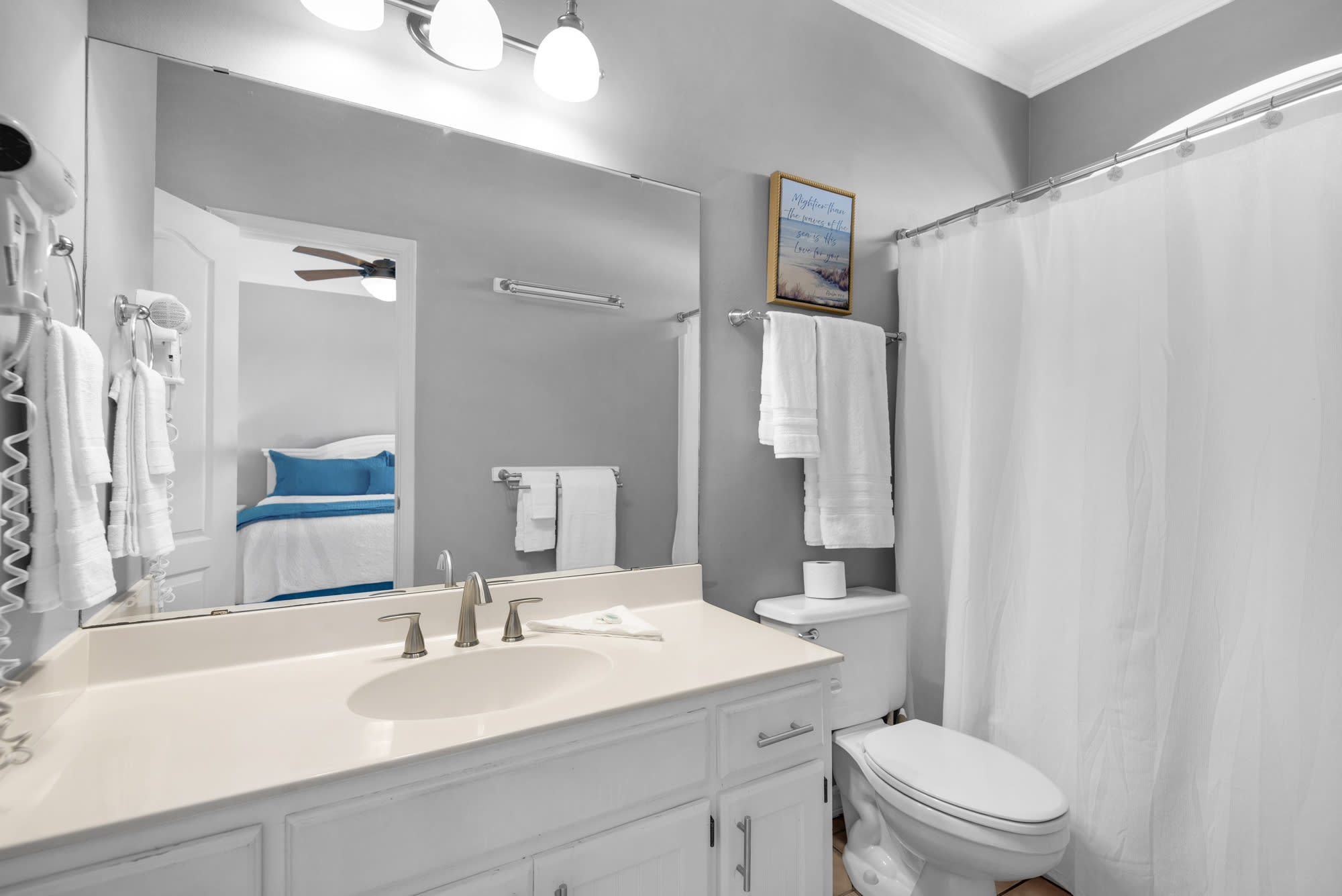 upstairs bathroom is shared by both upstairs bedrooms