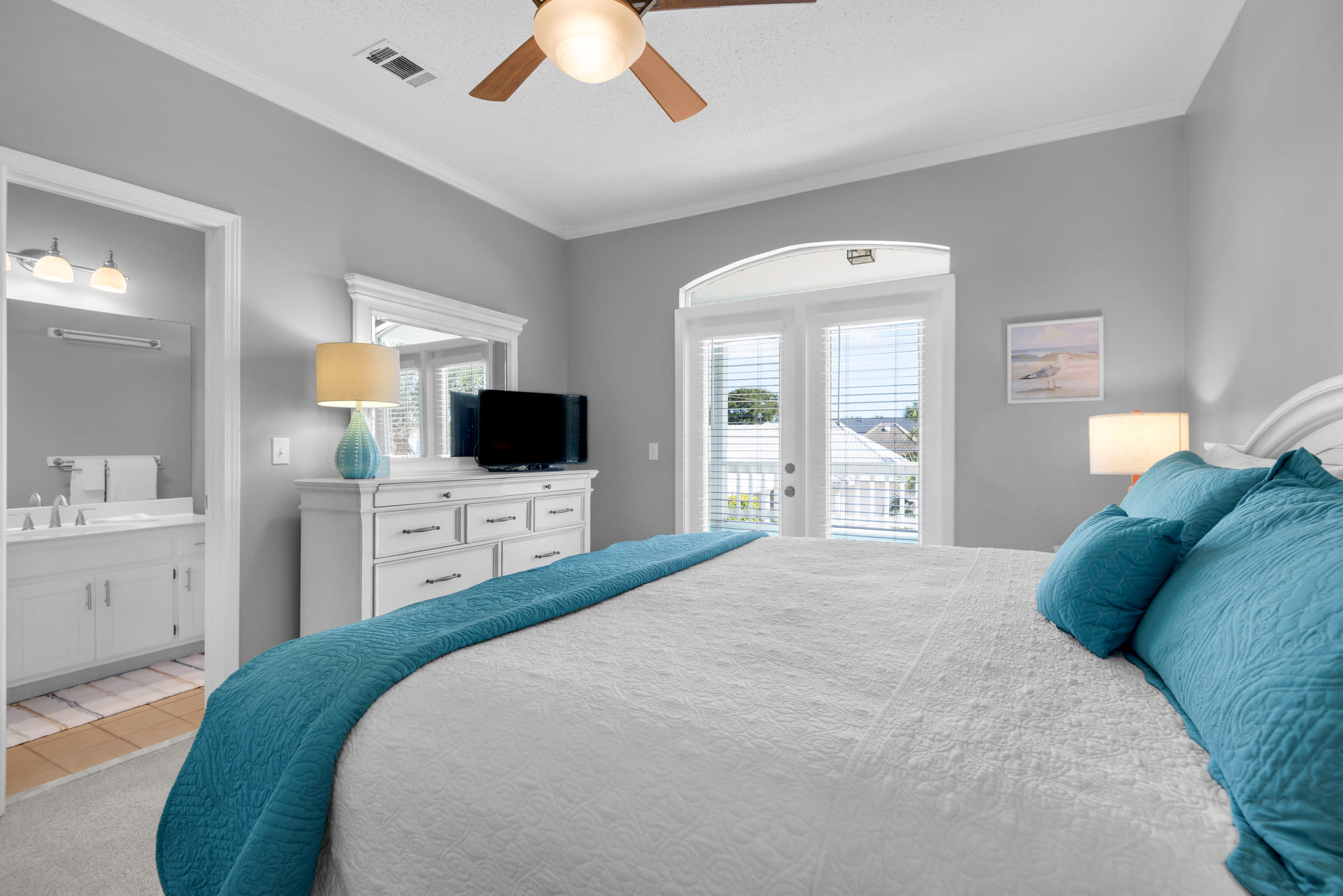 Flat screen tv and access to balcony form second Master