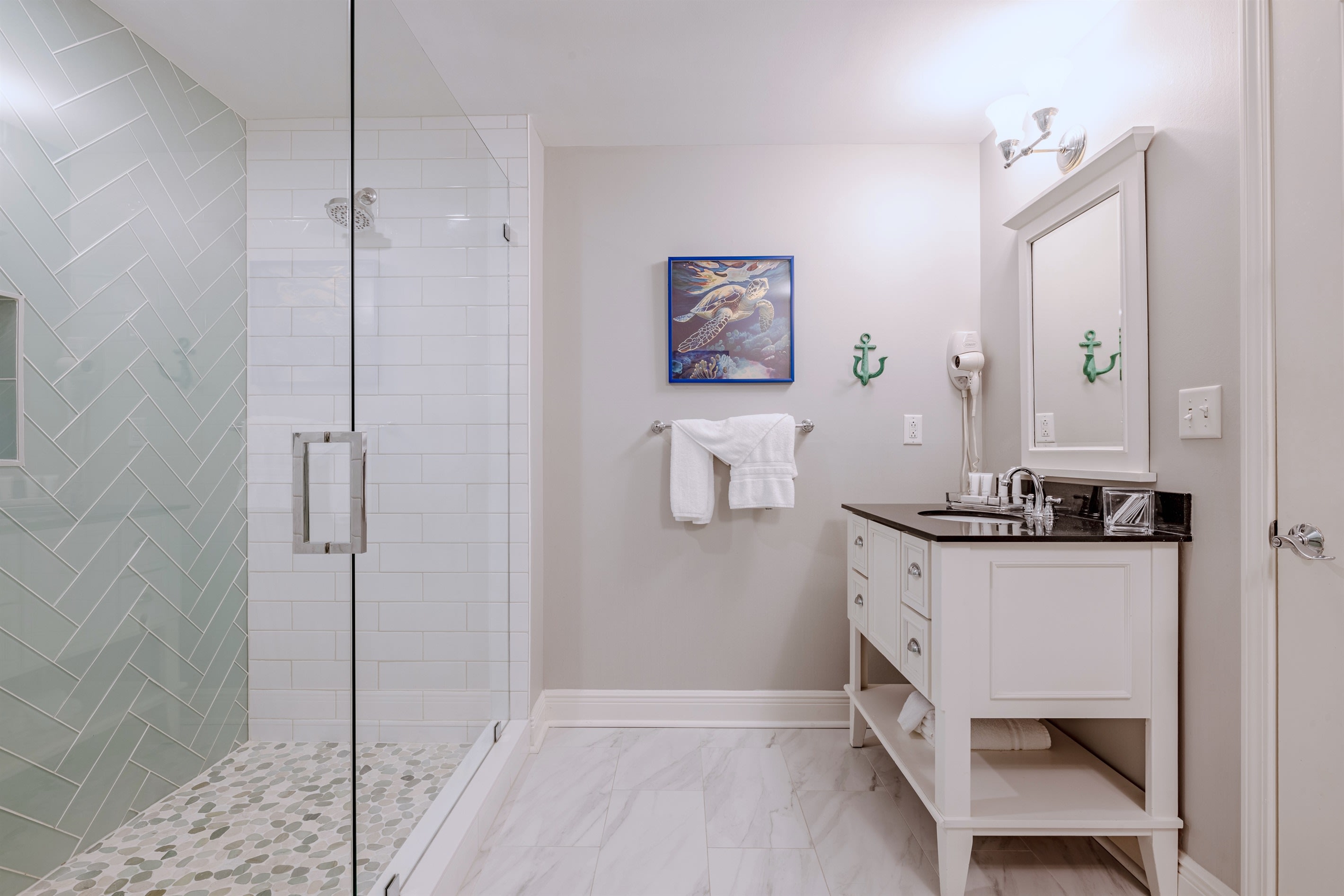 Spa-like Master Bathroom with dual his and hers vanities with all the must-haves.