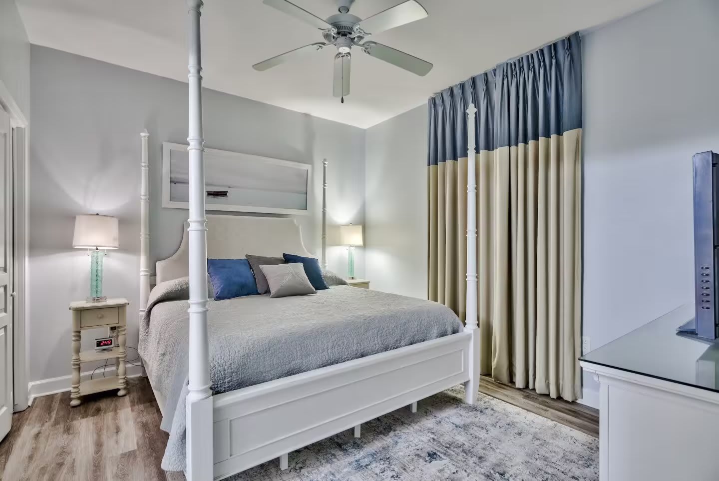 King size bed, black out curtains and luxury vinyl flooring.