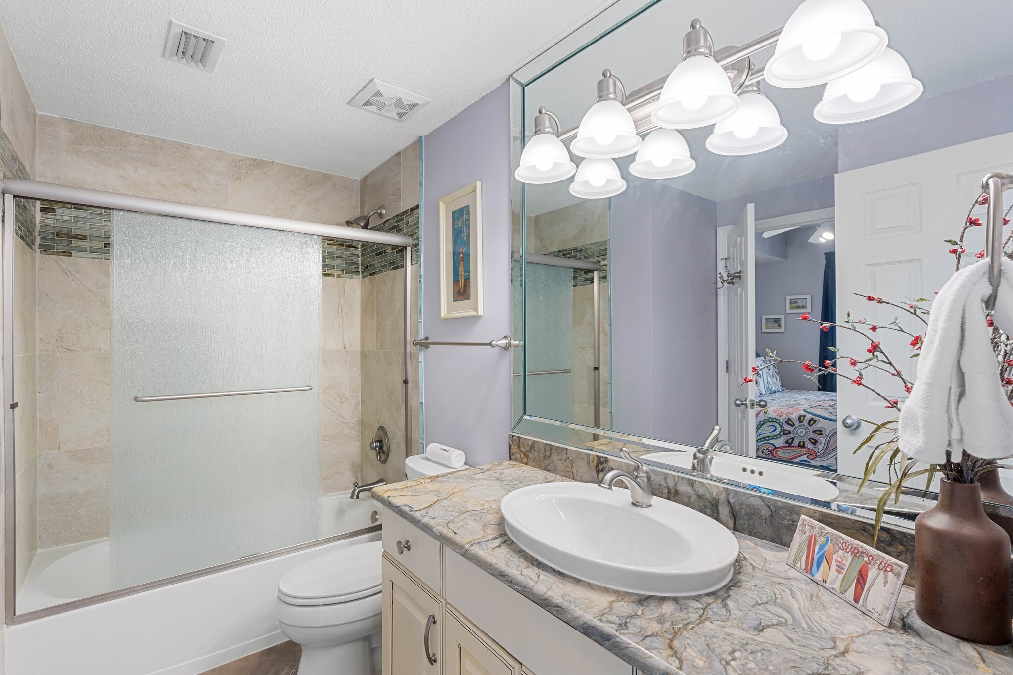 Spacious condo bathroom w/ extended vanity & plenty of room to get ready. Spacious condo bathroom w/ extended vanity & plenty of room to get ready.