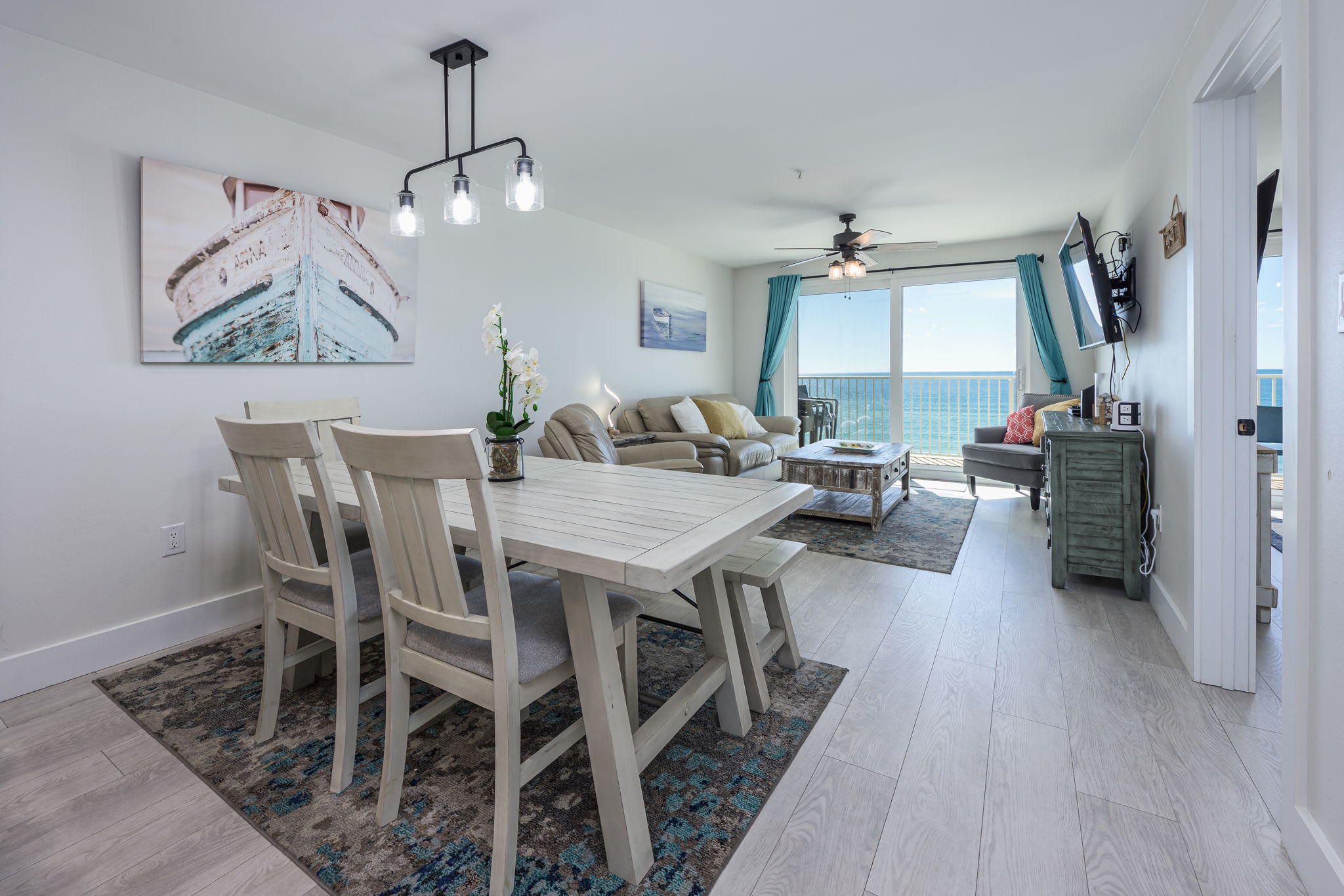 "Dine with a view! This open-concept space effortlessly flows into the living room and balcony, showcasing endless Gulf waters. ????? #OceanfrontDining #CoastalLiving"