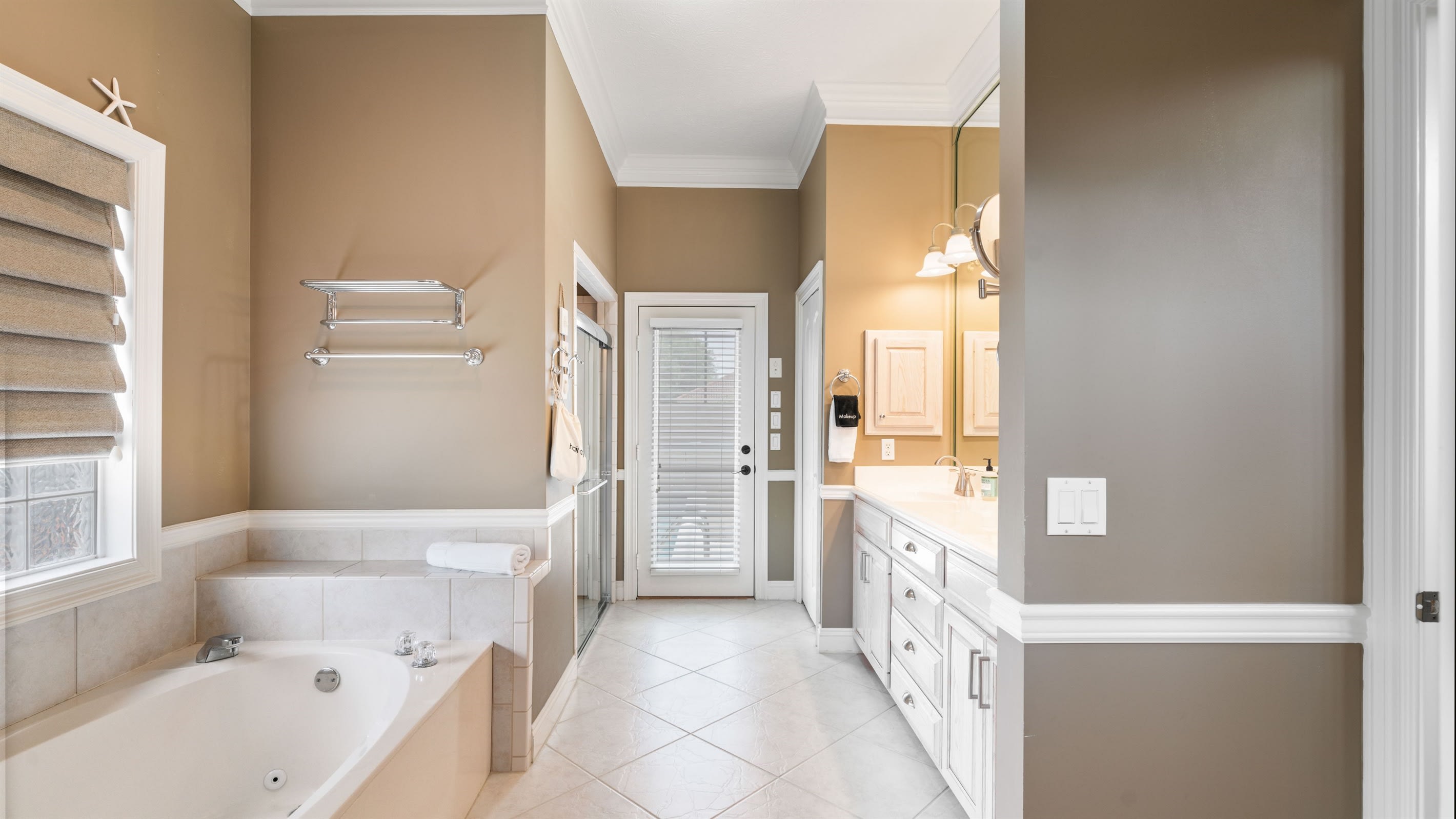 Master Bath Exits to Pool Area for Convenient Bathroom Access