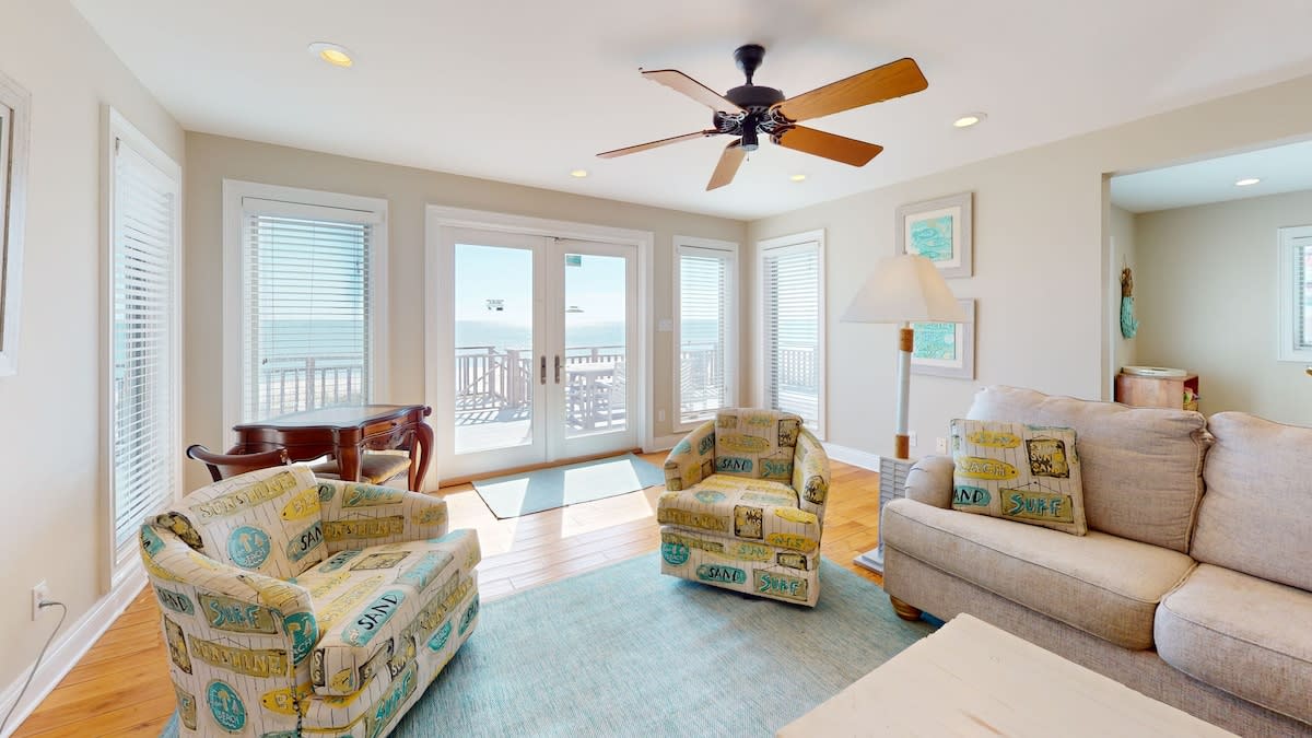 First Floor living area with doors to deck