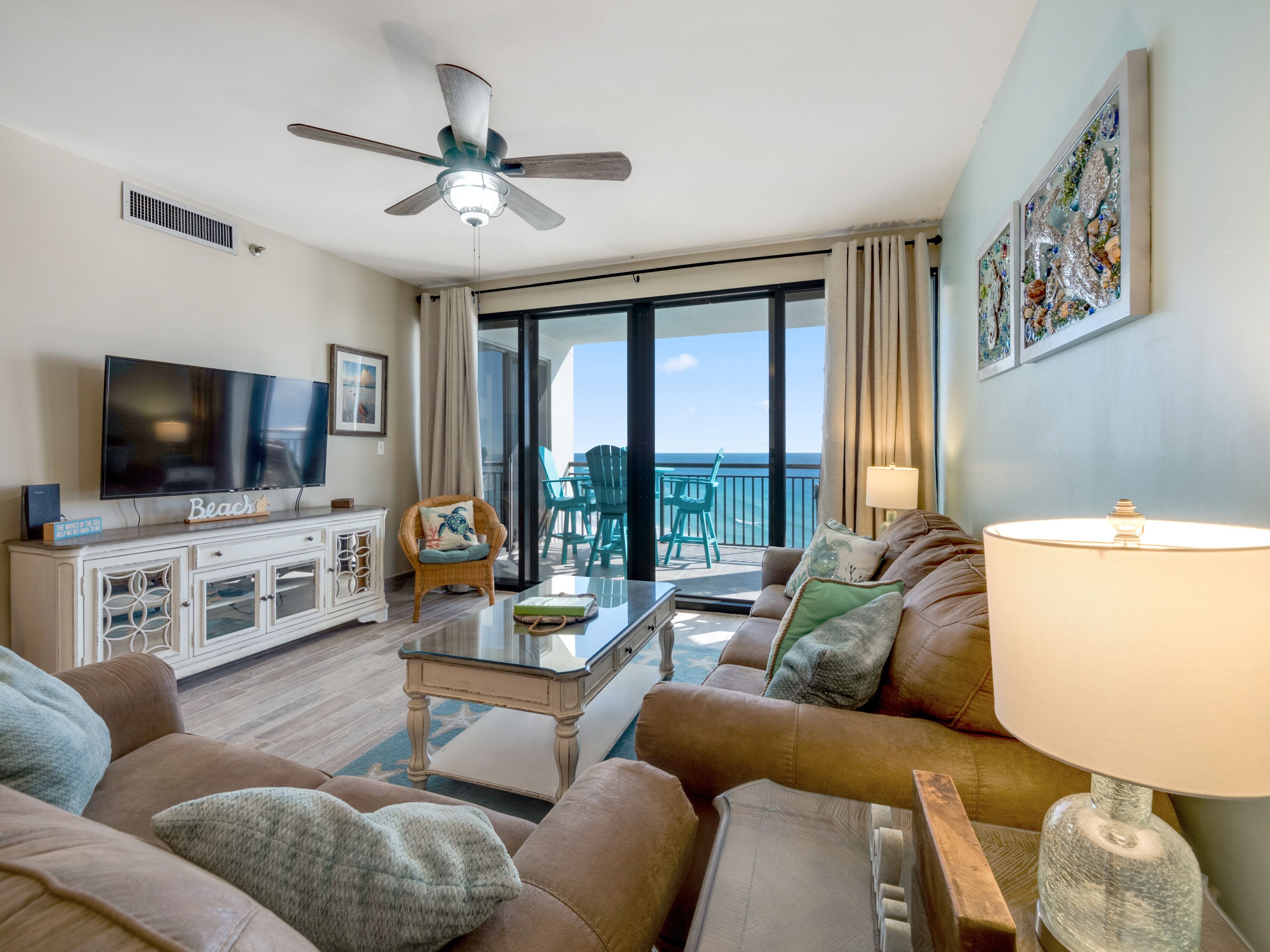 living room- comfortable seating for all guests with Gulf front views from the condo balcony.