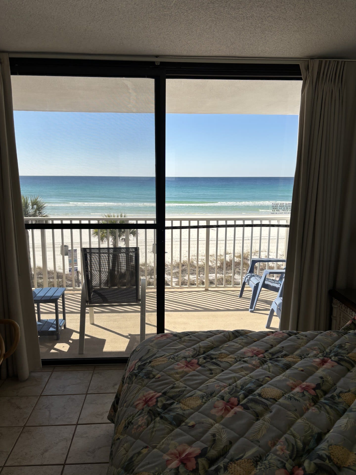 View of beach from bedroom