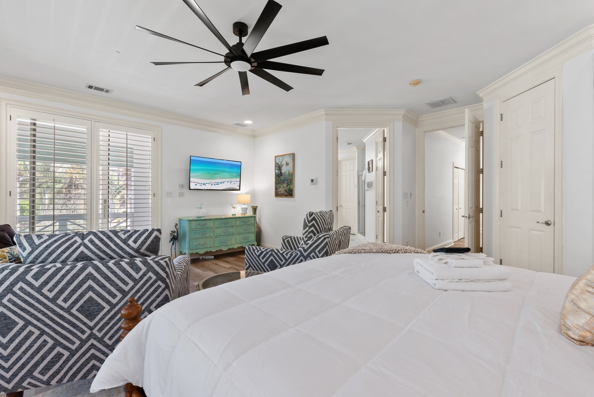 Plantation shutters leading to your private balcony.