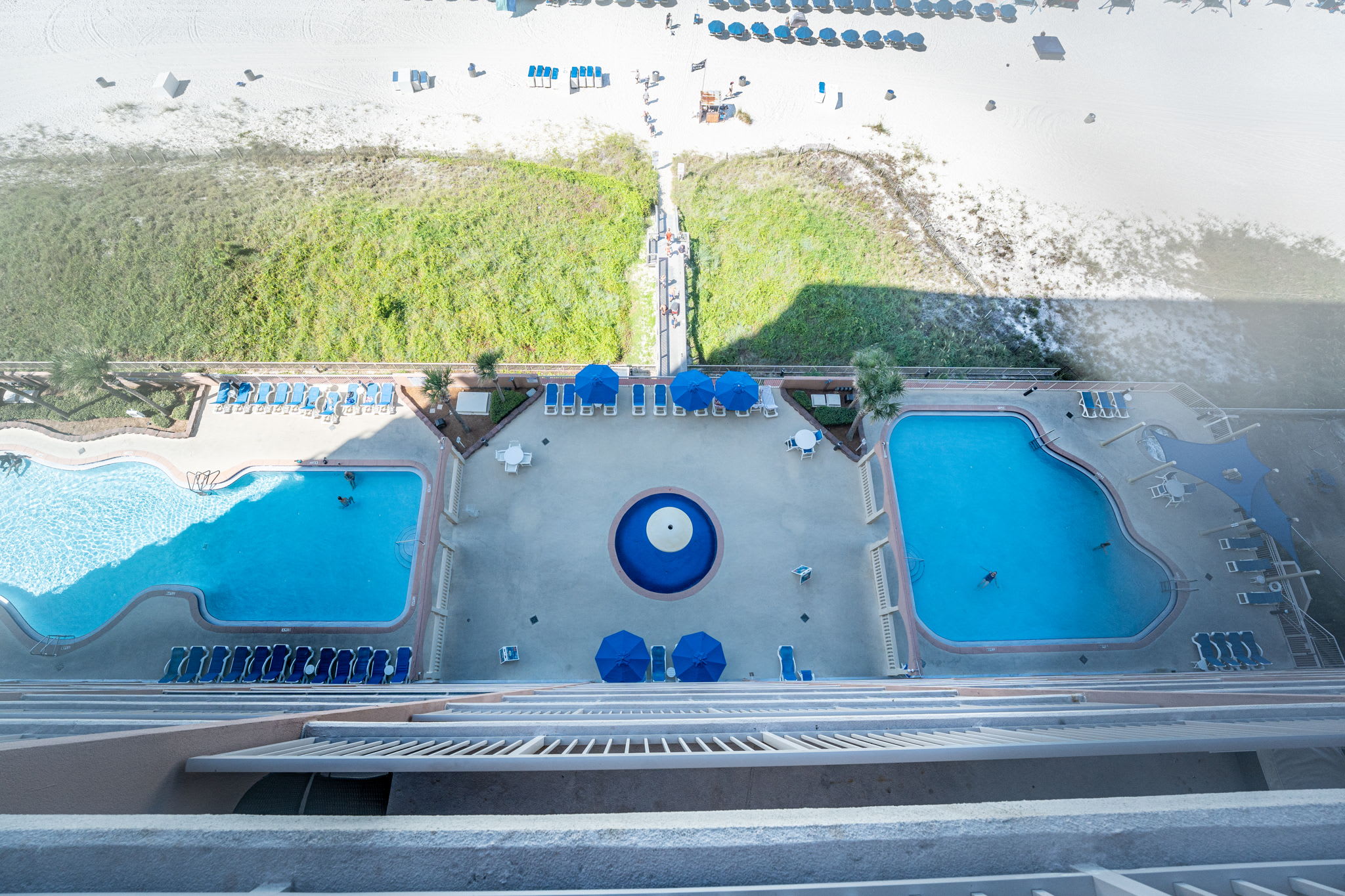Patio view of the pool and hot tub areas