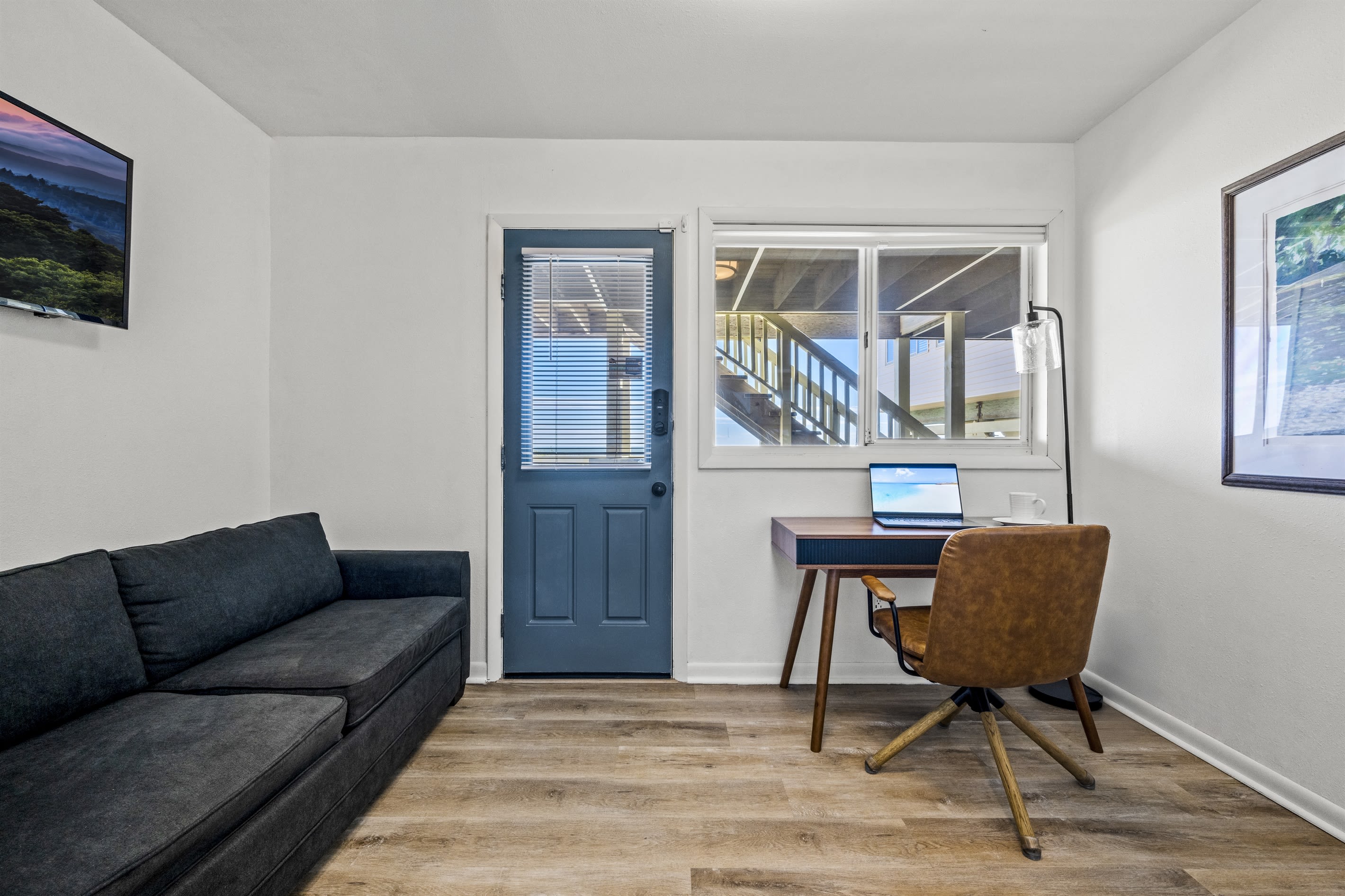 The office also features a full size sleeper sofa and smart TV.