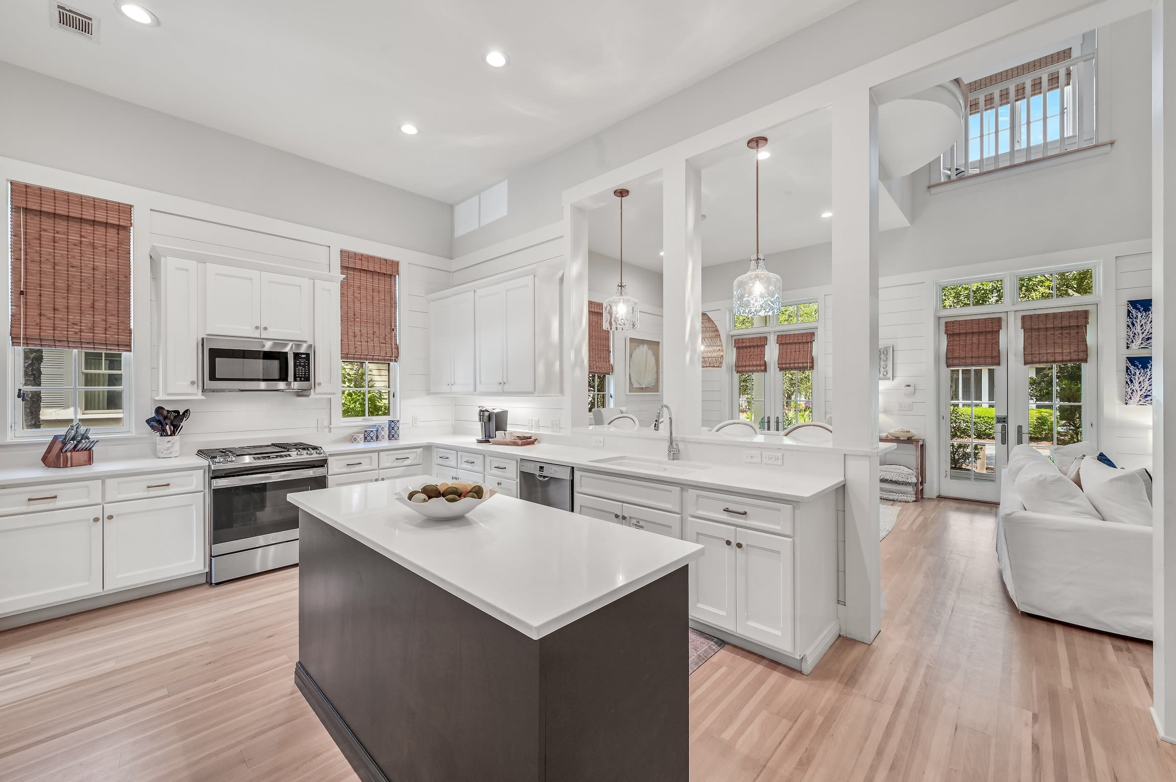 Updated kitchen with quartz countertops and stainless steel appliances