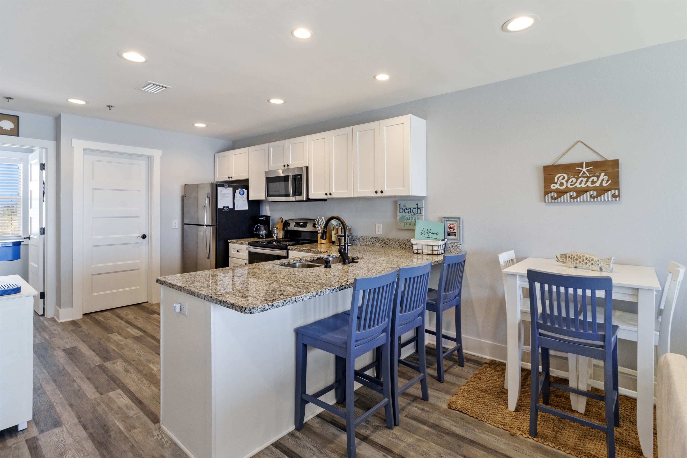 Bar seating for four and small table