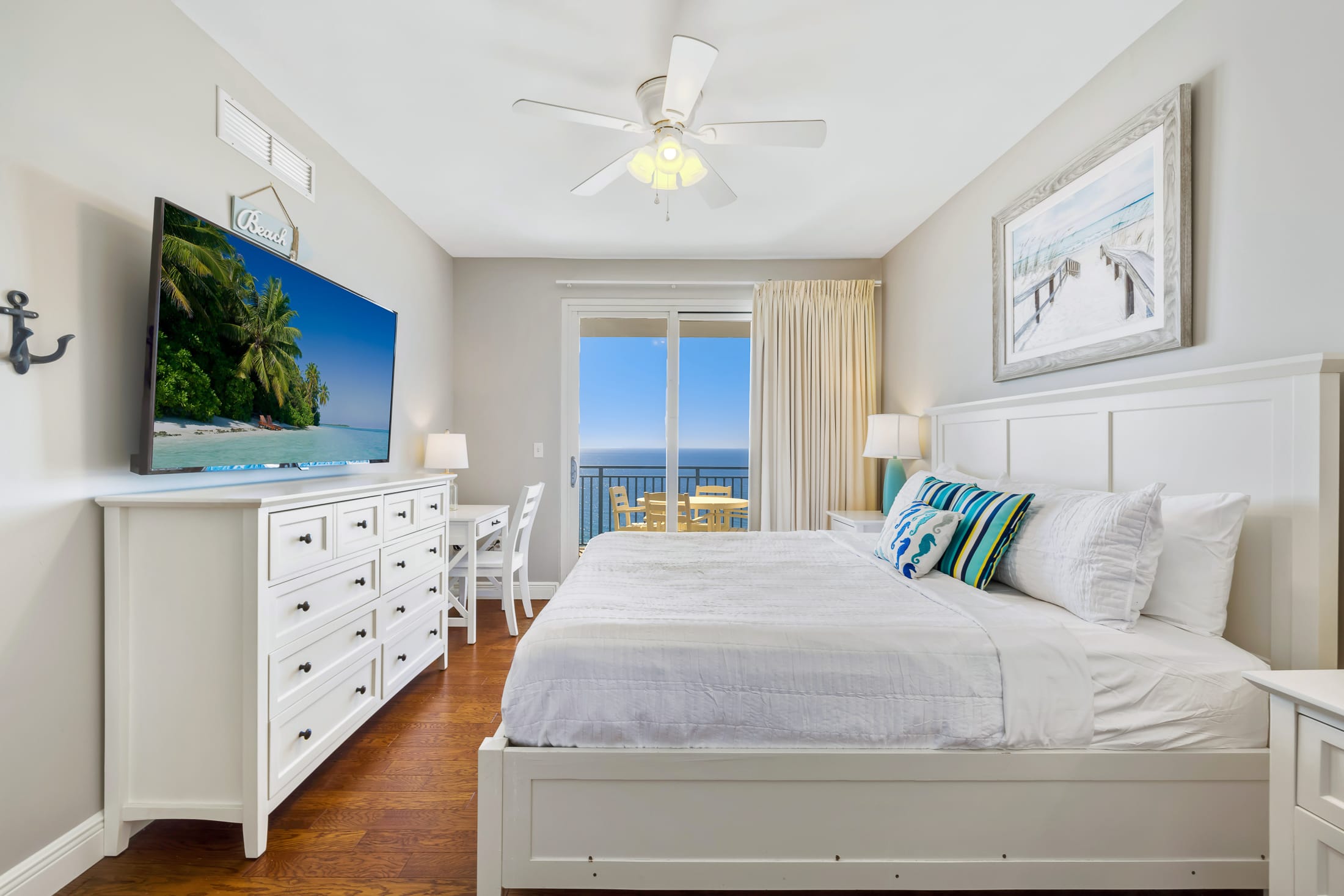 Wake up to the view of the ocean is this oceanfront master bedroom.  It also features a desk (with USB charging) for working remotely, if you really must work on vacation.