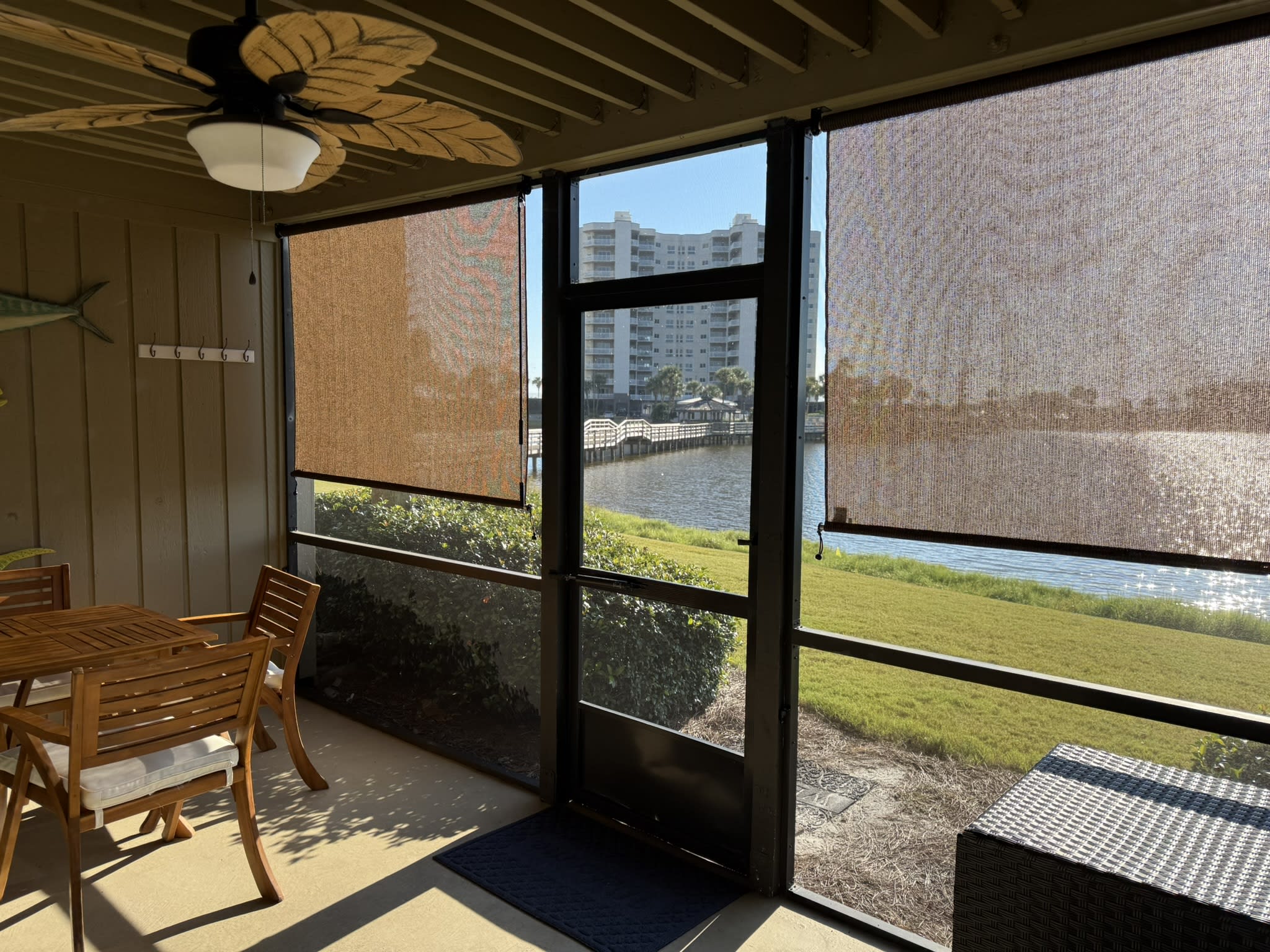 Screened patio with retractable blinds