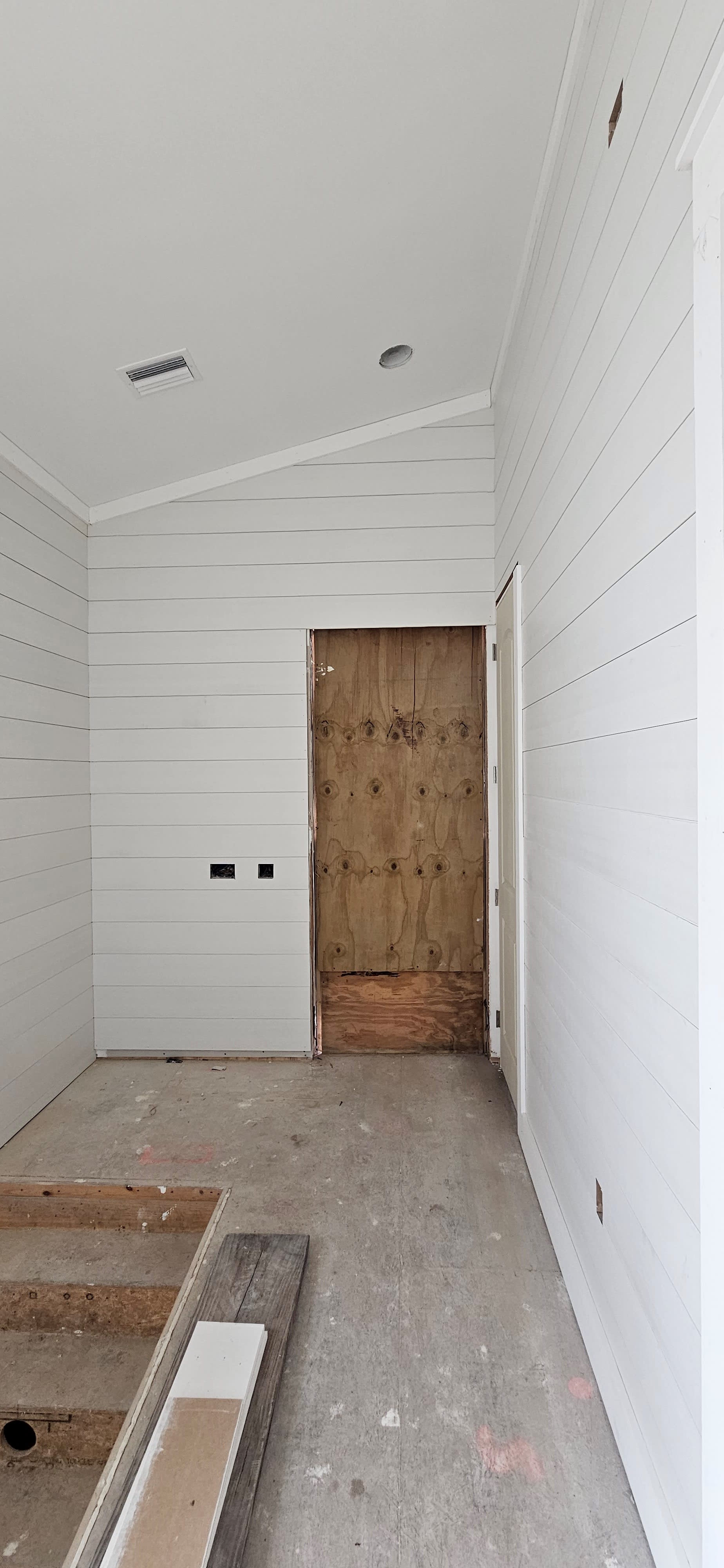 Carriage Foyer: Stairs up from Garage and Door to the Breezeway