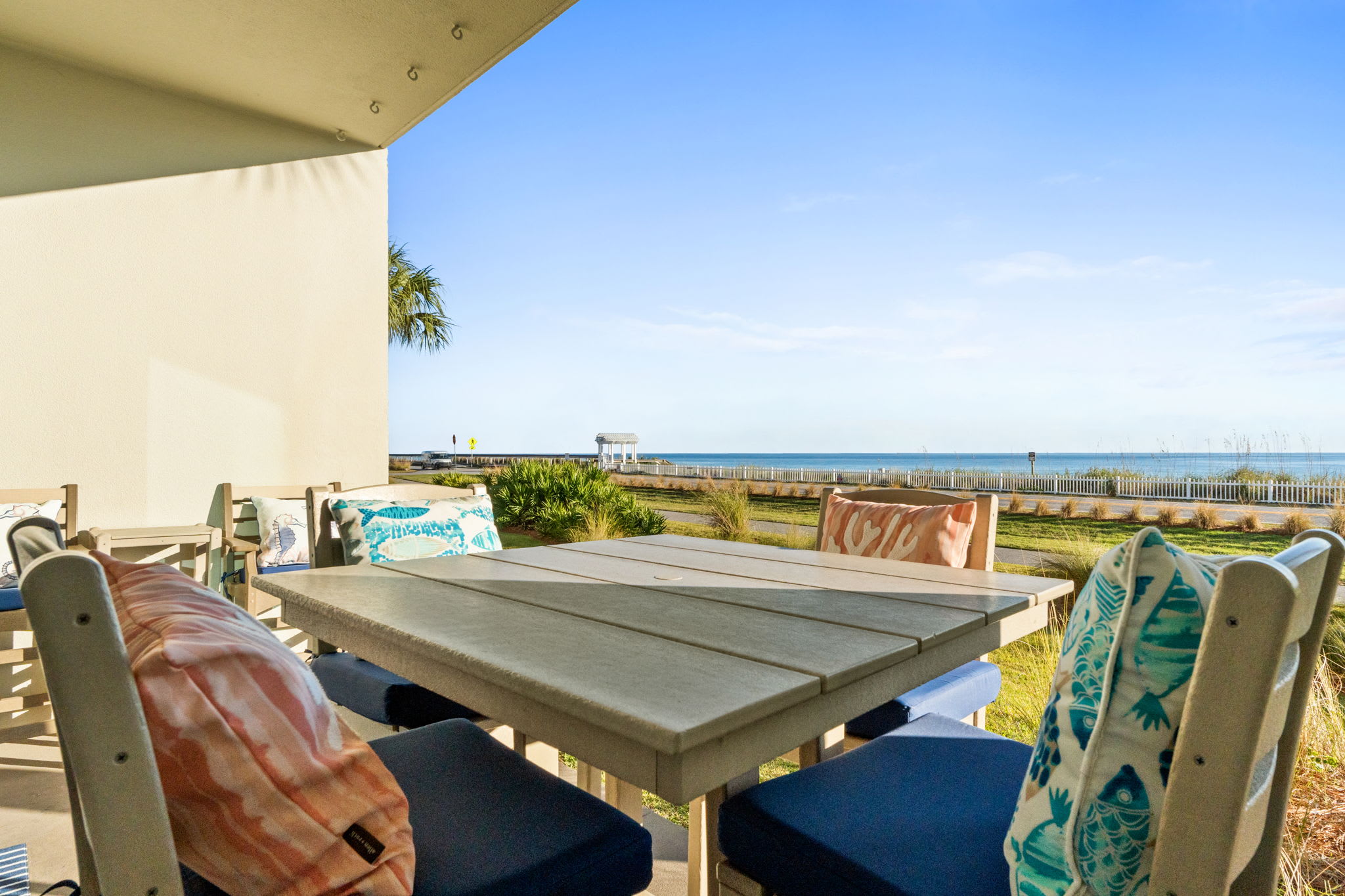 Outdoor dining patio with Gulf views- perfect for sunset meals 