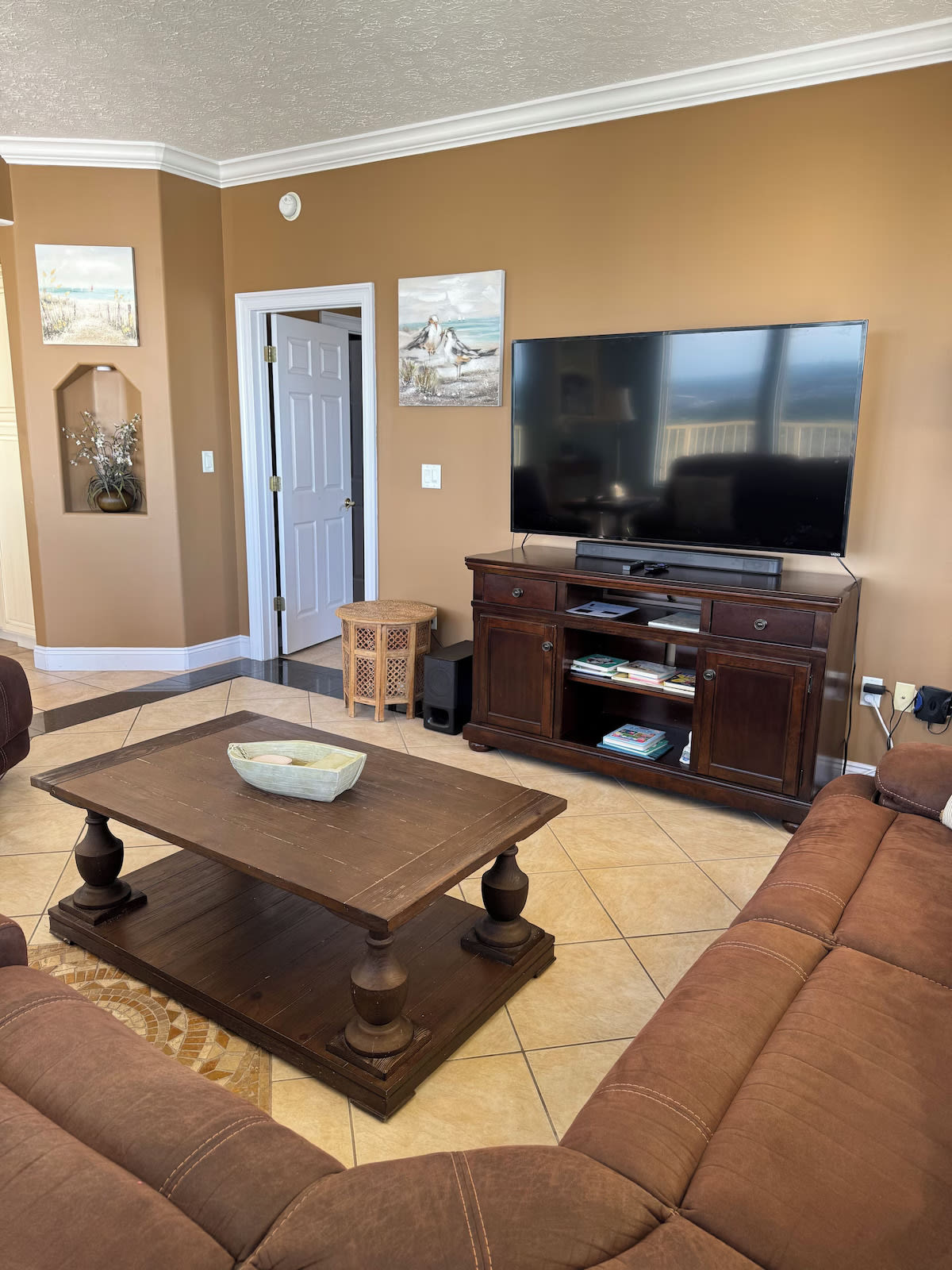 full size TVs in each bedroom and den