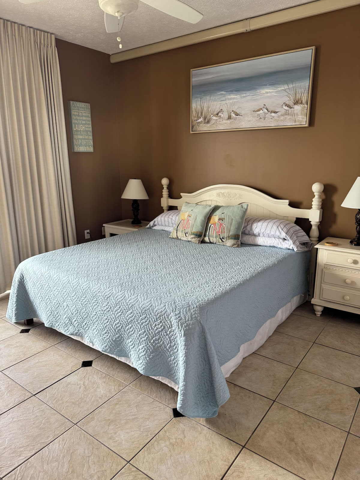 King size bed in guest room # 1. Has it's own sliding doors onto the. balcony.
