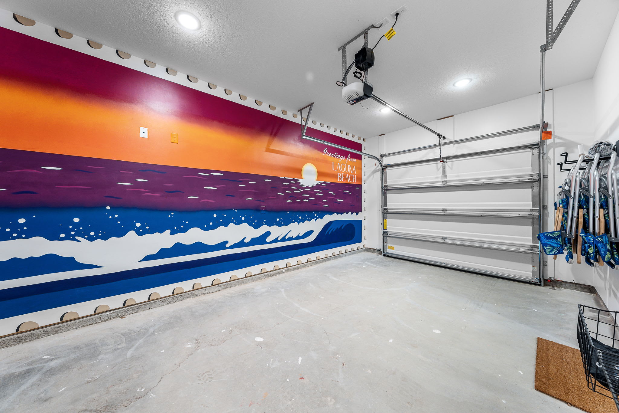 The garage mural offers a perfect background for an #Instaworthy photoshoot.