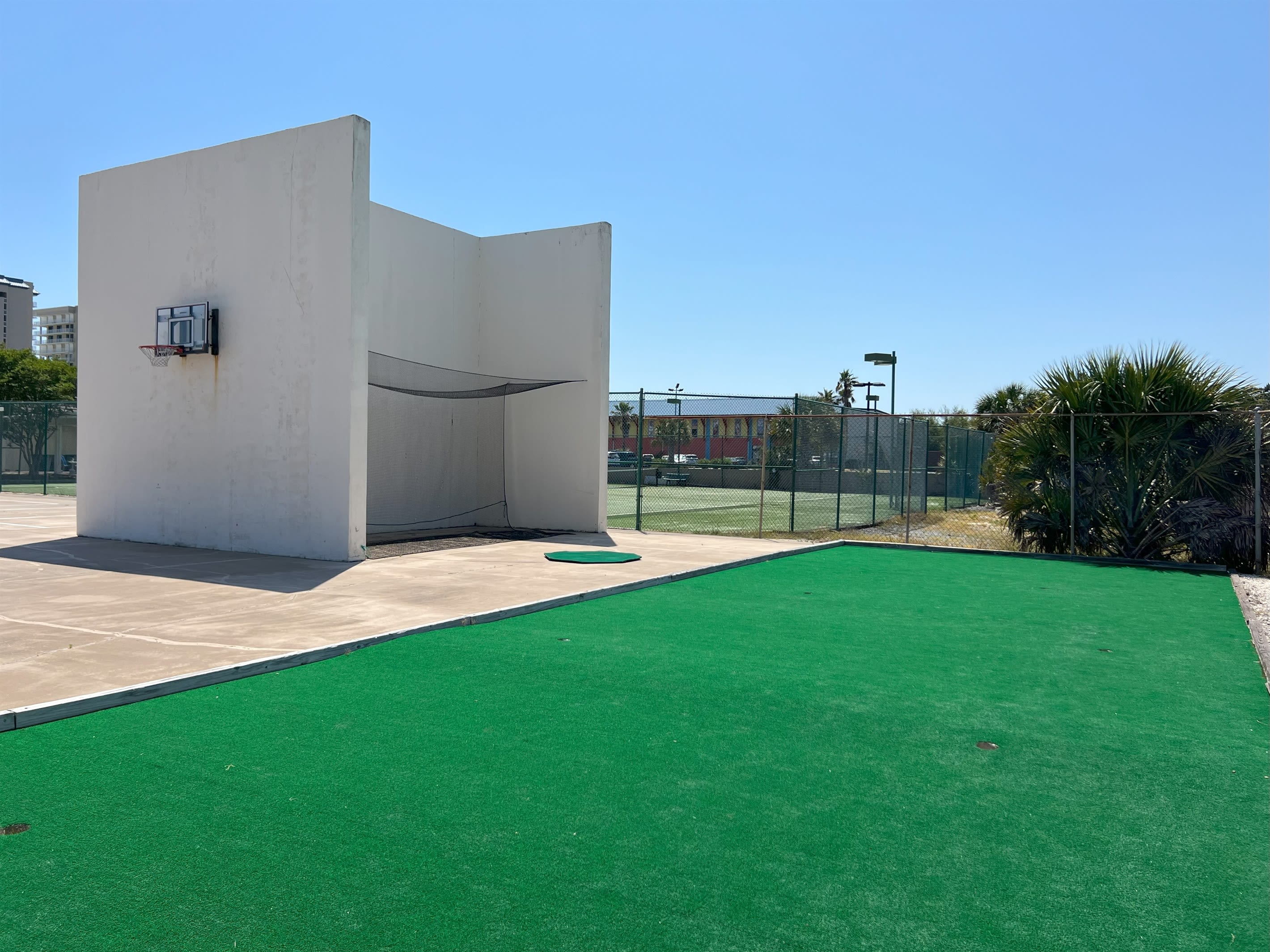 Putting Green, Practice Tee, basketball goal (BYO equipment).  Squash on the other side of the basketball goal.