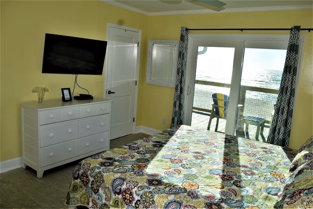 Master bedroom with in suite bathroom and deck acc