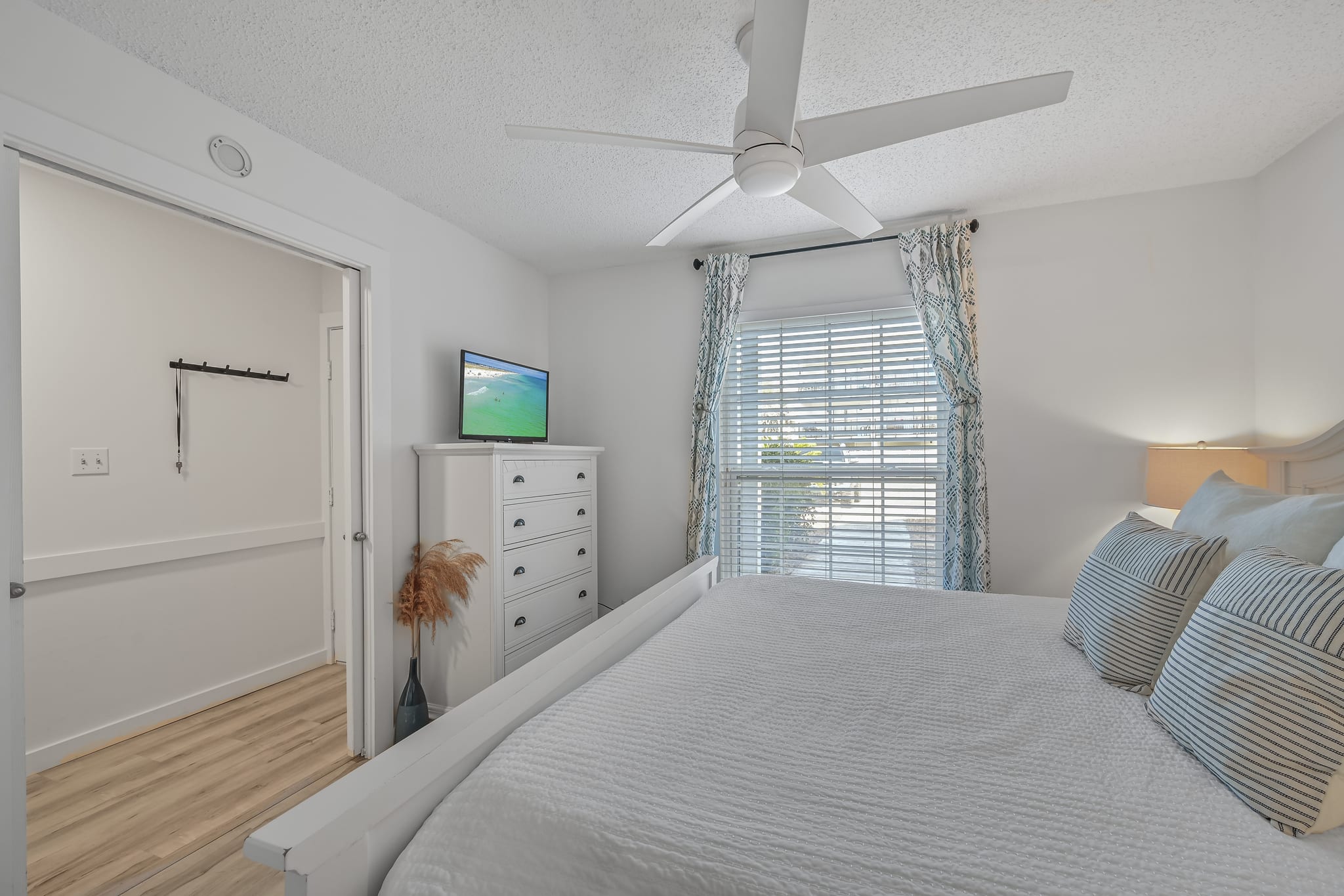 A view of the cozy master bedroom.