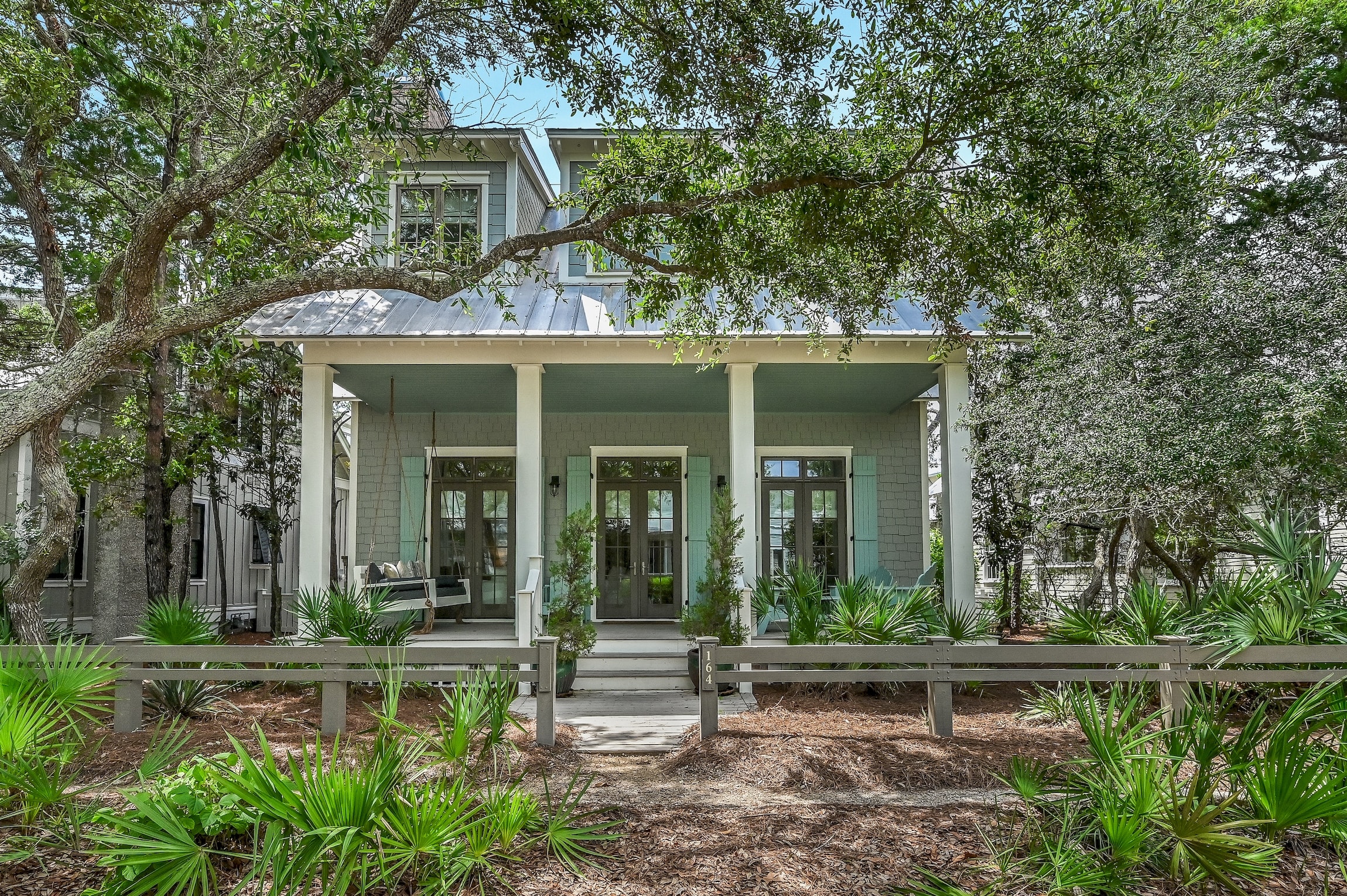 House is located on a quiet street in Watercolor