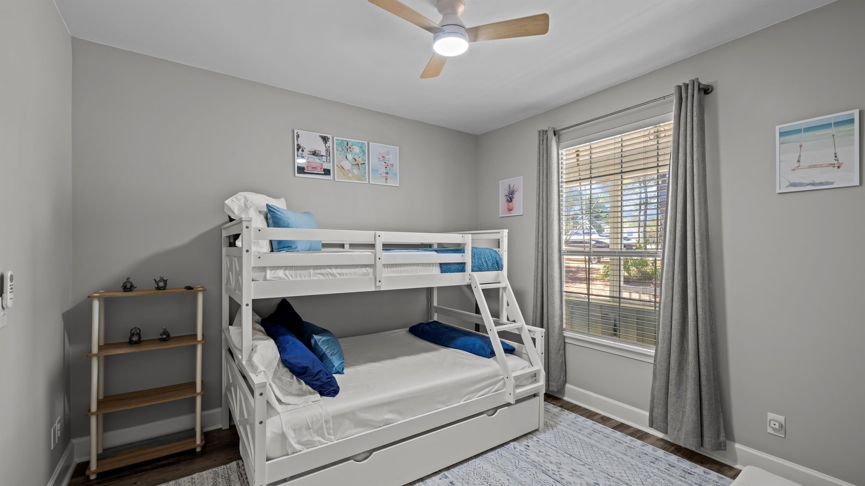 The ultimate kids' hangout- twin-over-full bunk with a trundle and a chair that converts to another twin!