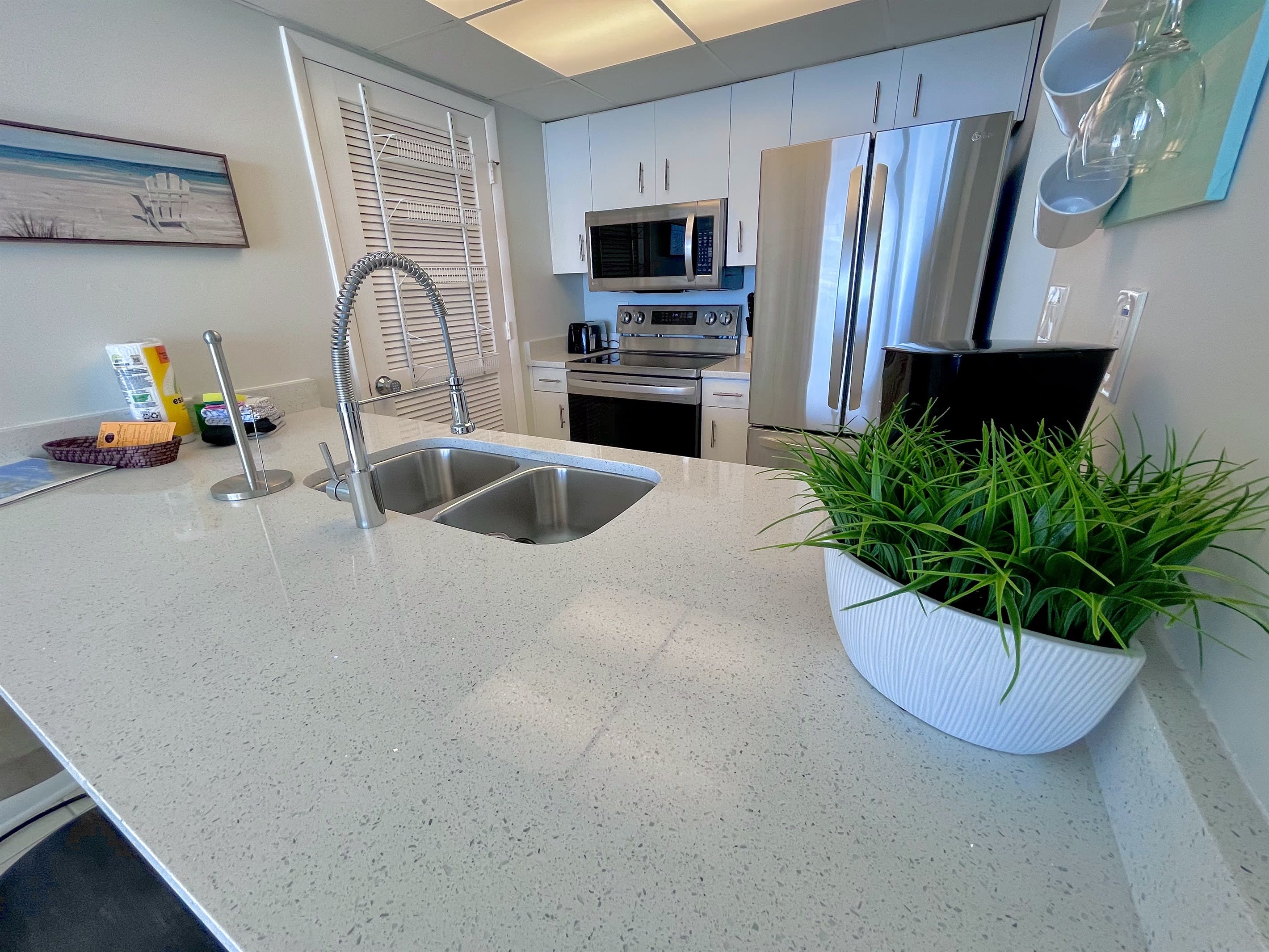 Clean and wide open counter tops with all new stainless steel appliances