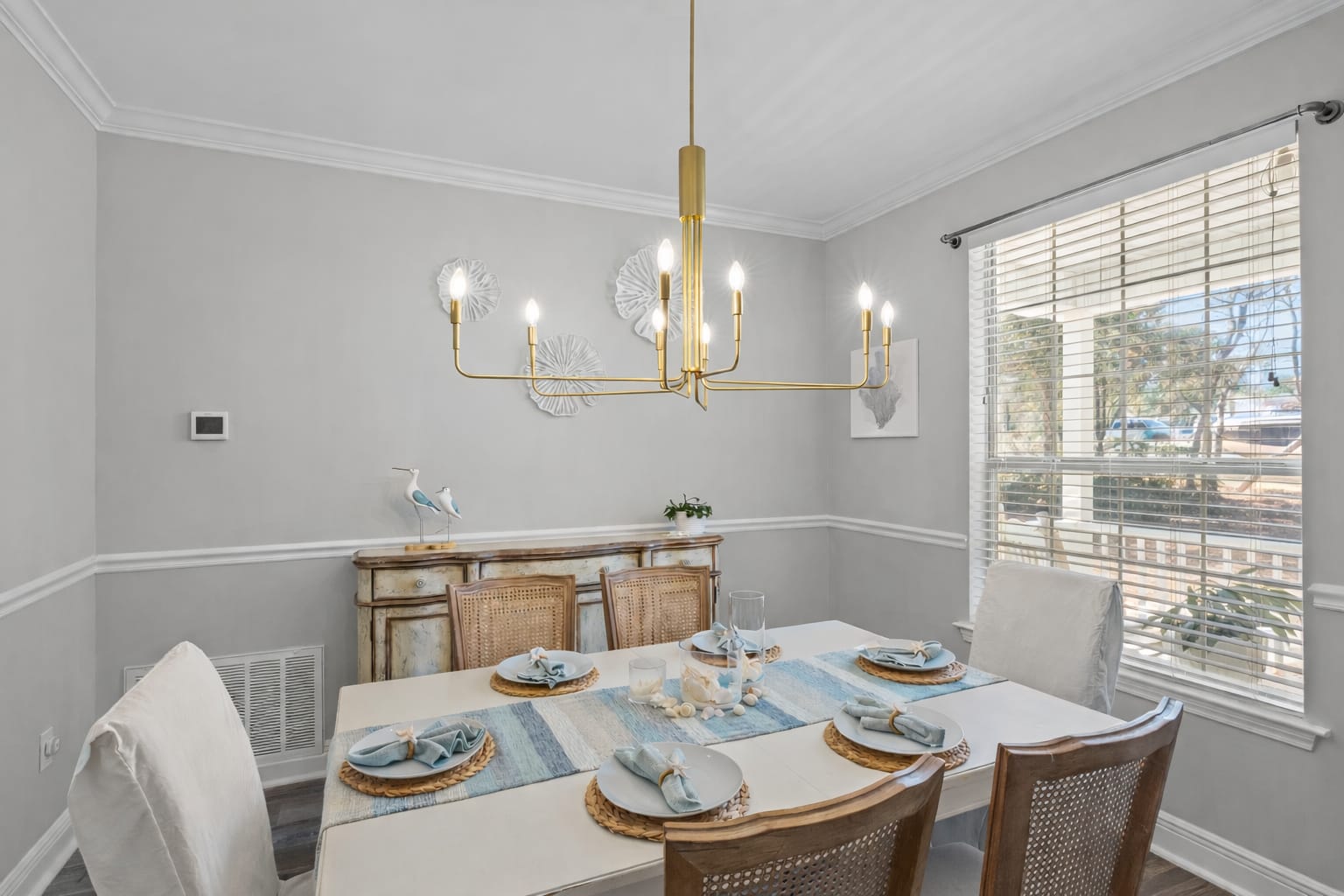 Coastal dinners, card games, or morning mimosas — the heart of the cottage is ready for memories.