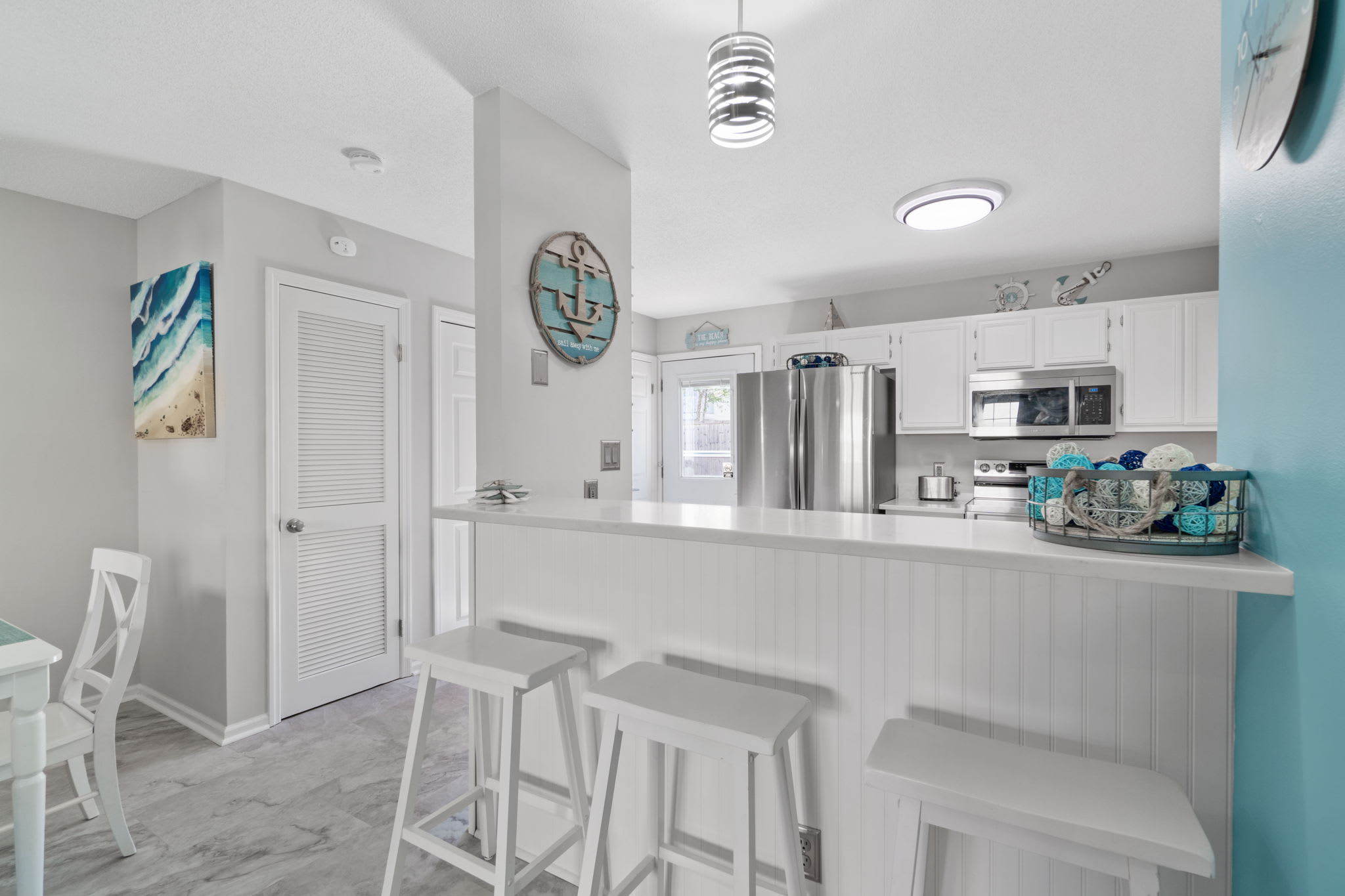 Dining into kitchen area. Seating for 8