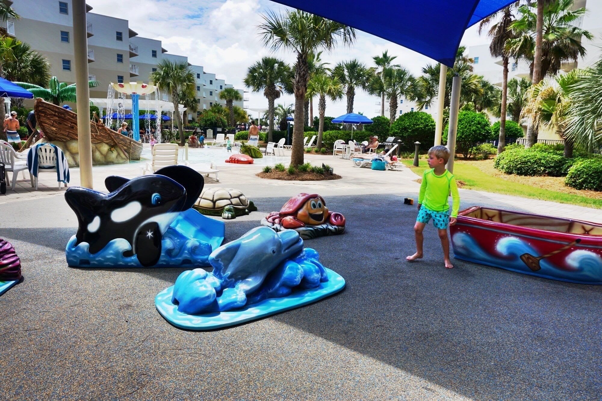 Dry park with sun shade just a few steps away from B218. 