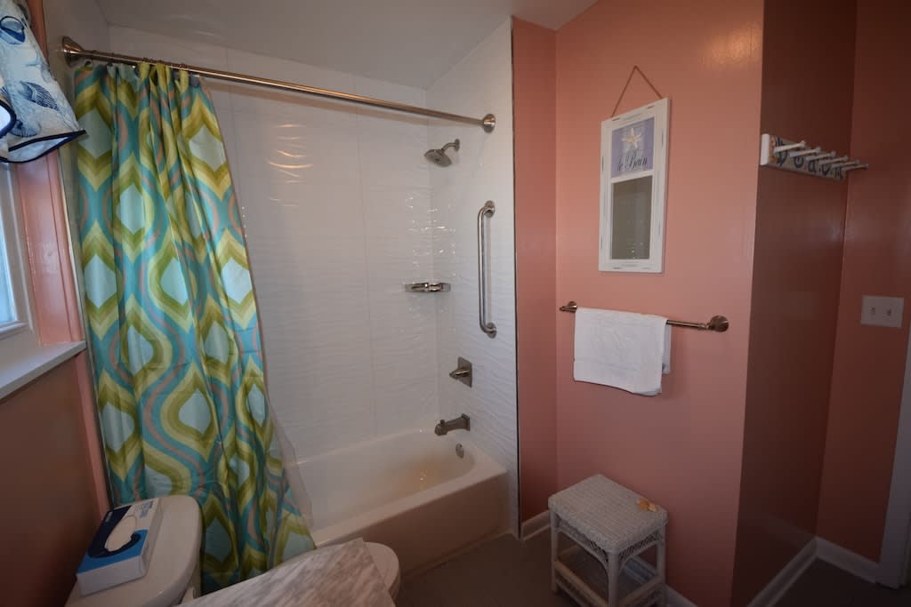 tub and shower (with grab bar) in 2nd bathroom tub and shower (with grab bar) in 2nd bathroom