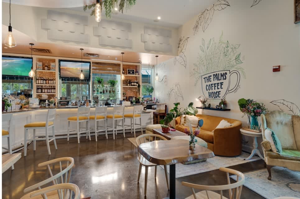 On-site coffee shop setup w/ counter seating for easy mornings.