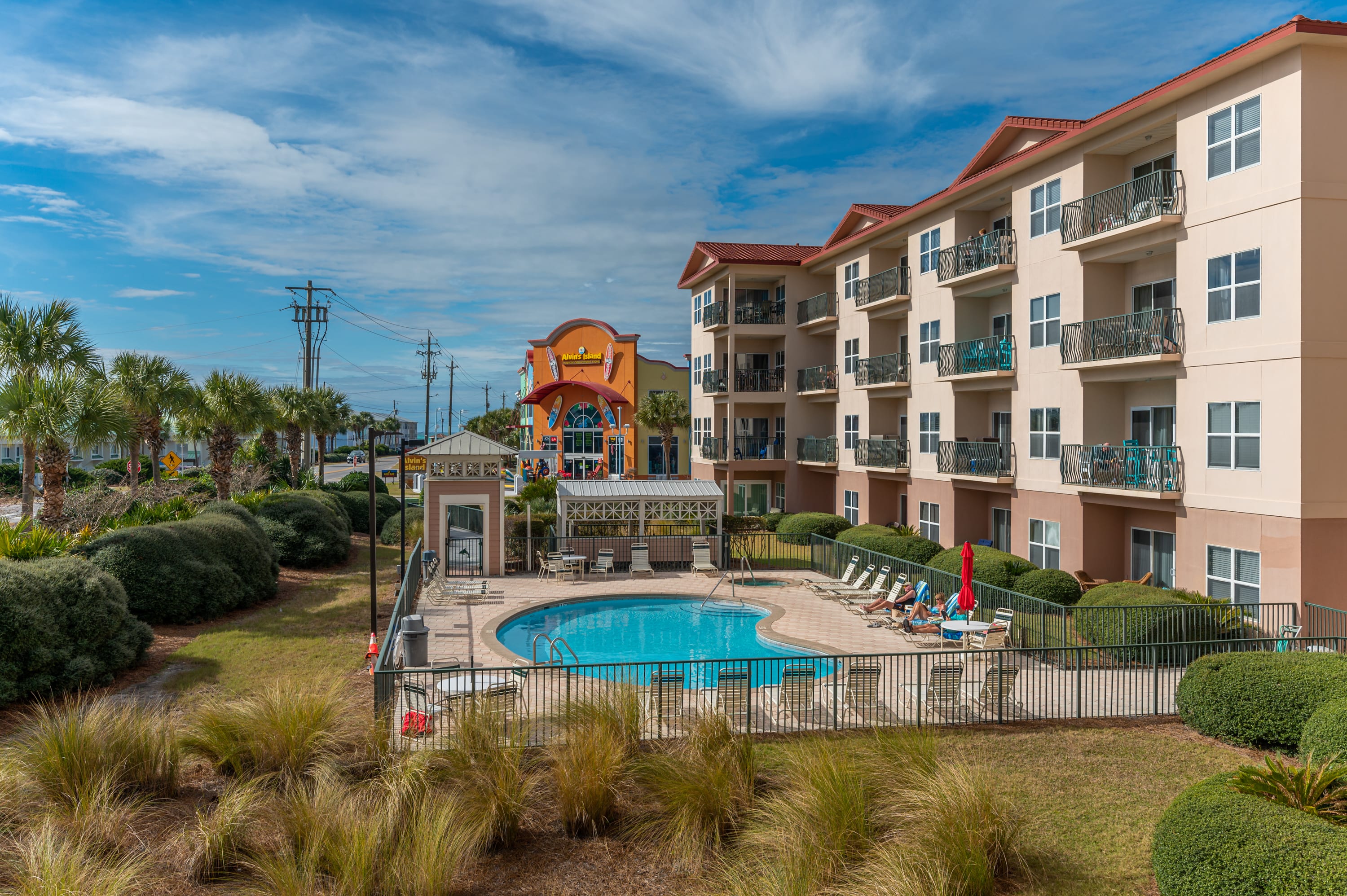 Balcony over looks the pool.