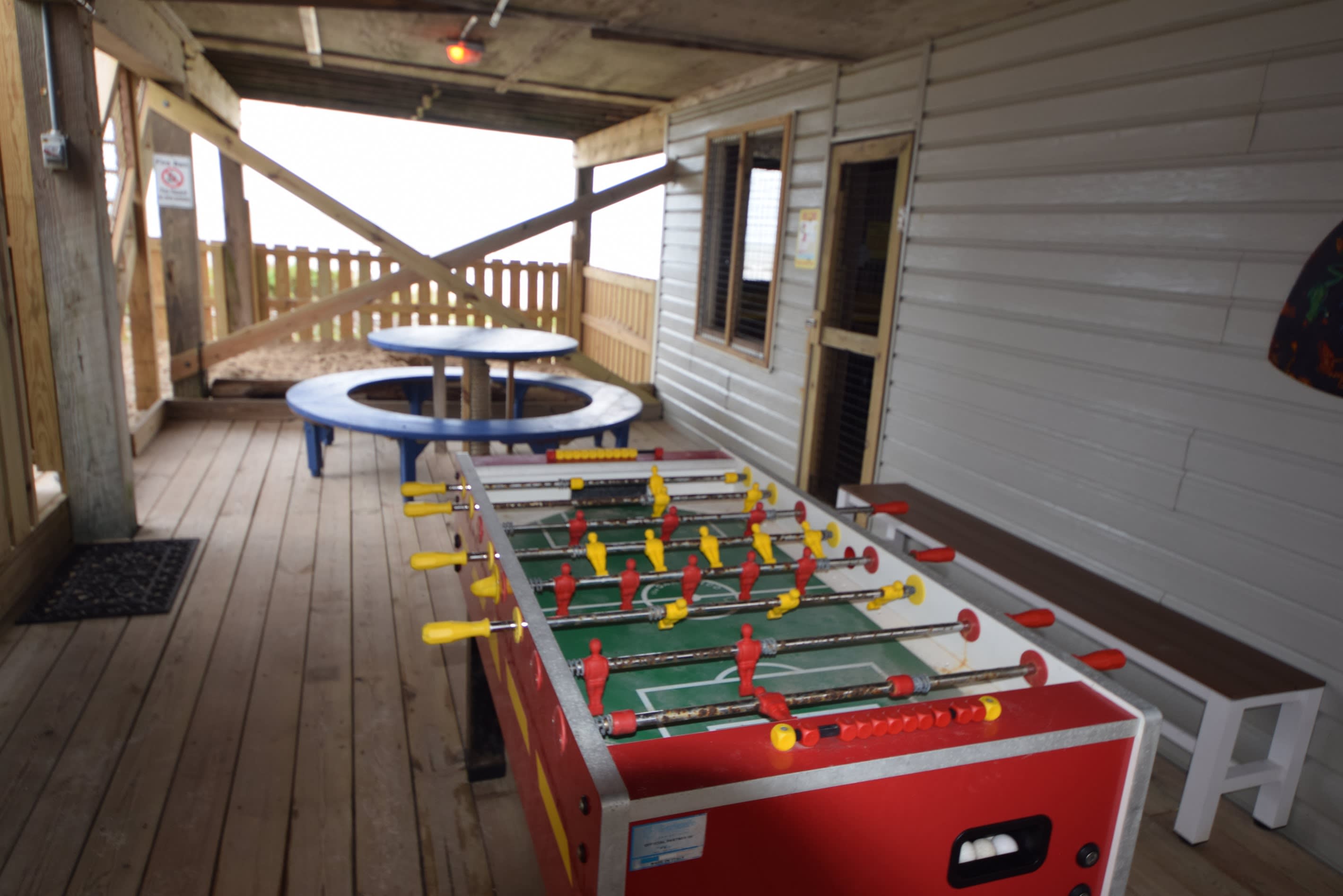 foosball table in one of the game rooms