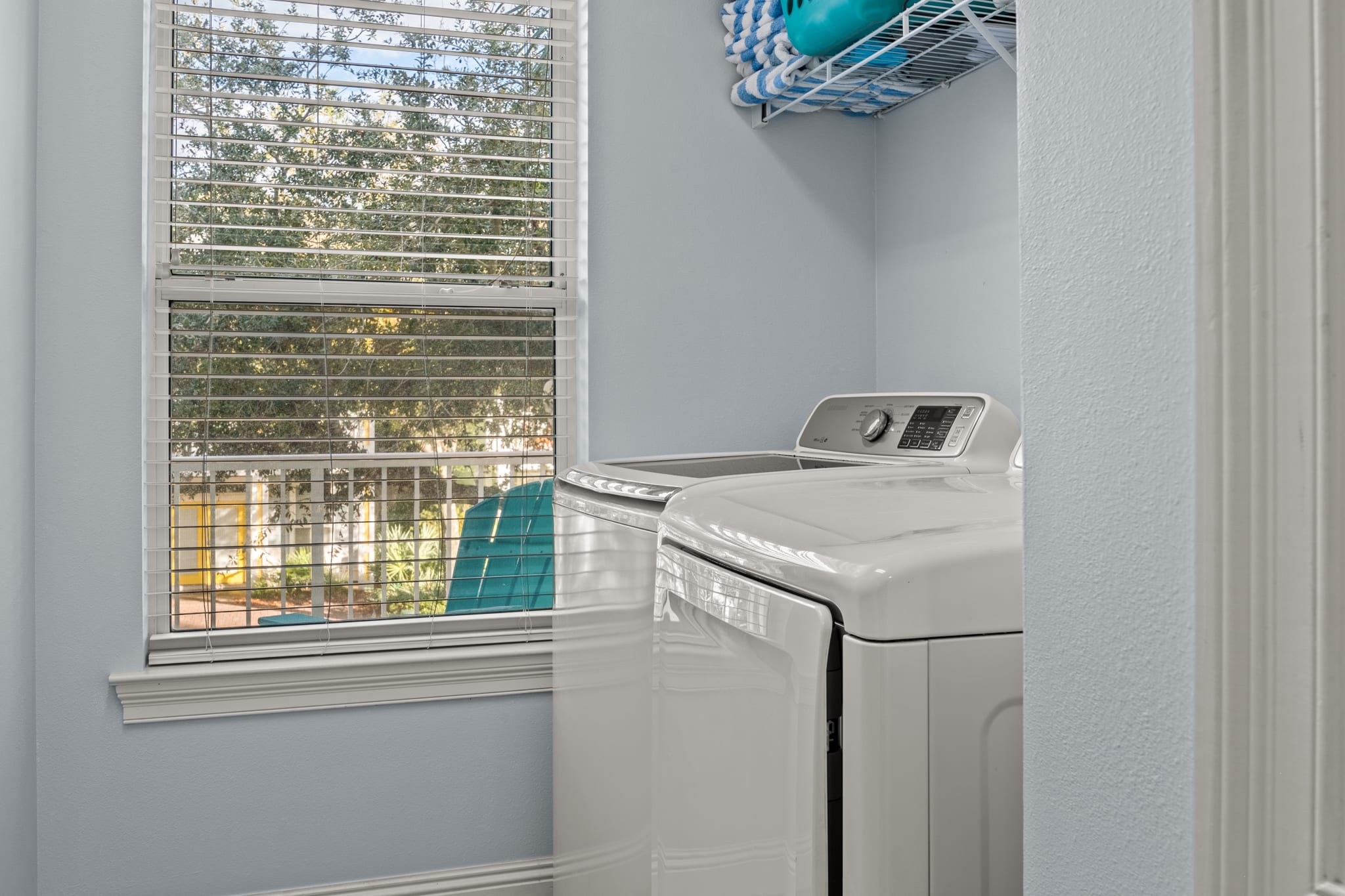 Full laundry room on second floor with beach and pool towels!
