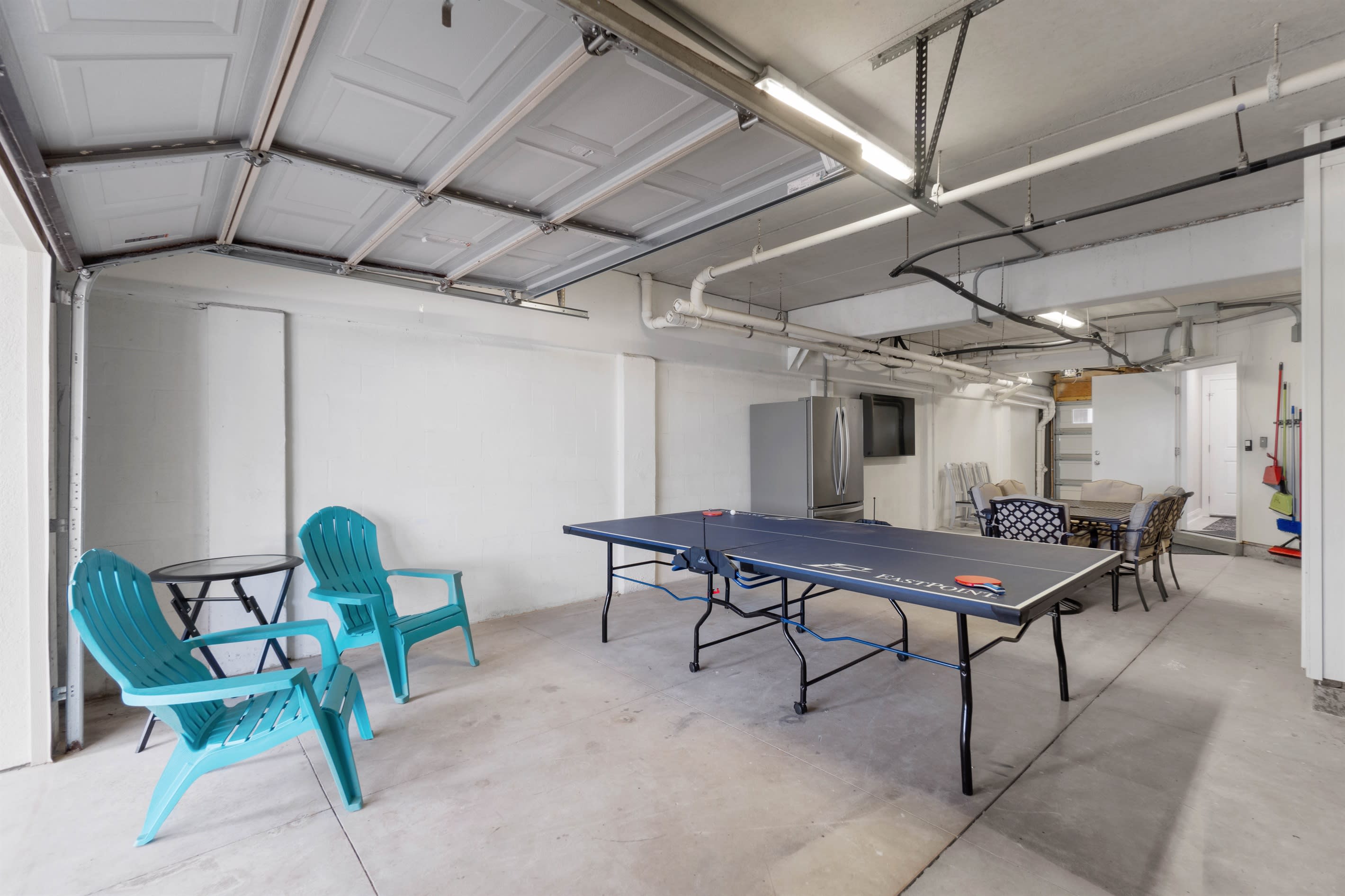 Garage W/ Extra Fridge, Smart Tv, & Ping Pong Table