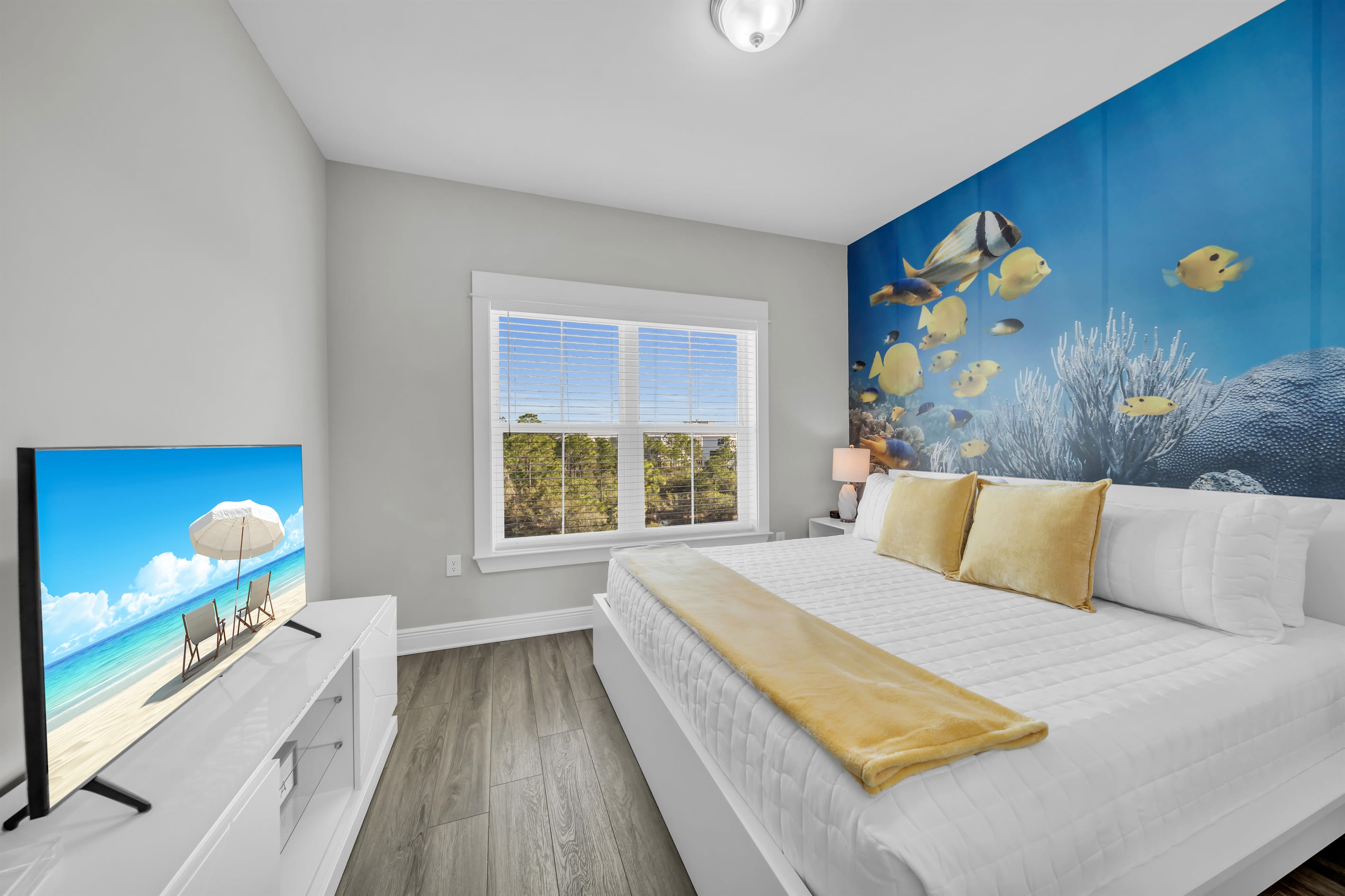 The underwater view of bedroom 3 from the full wall mural will have you dreaming of the ocean.  This room also features it's own arcade system with 50 games including PacMan and Centipede.  It's a kid's own getaway with its ensuite bathroom as well.