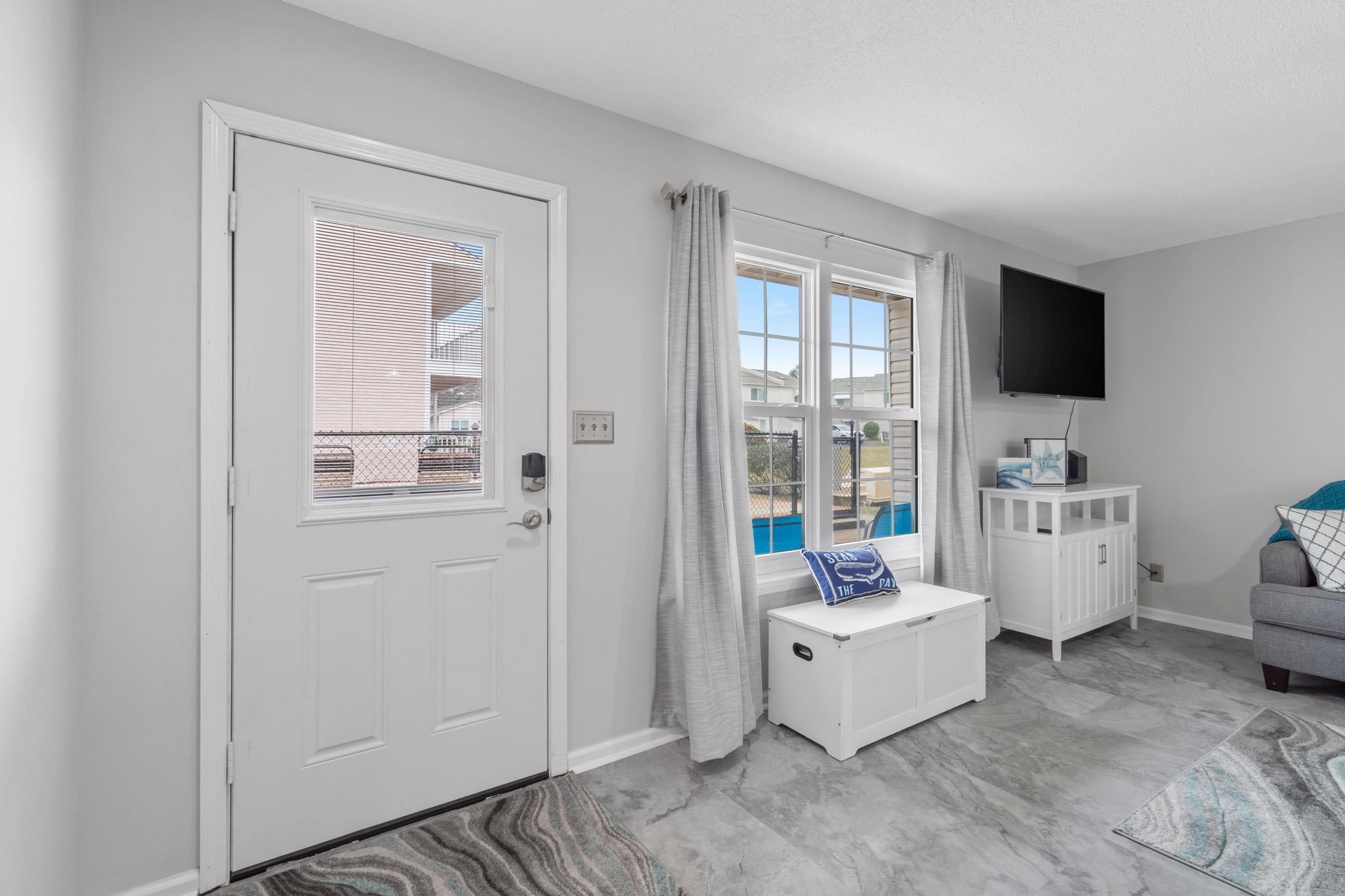 Door out to the patio and pool