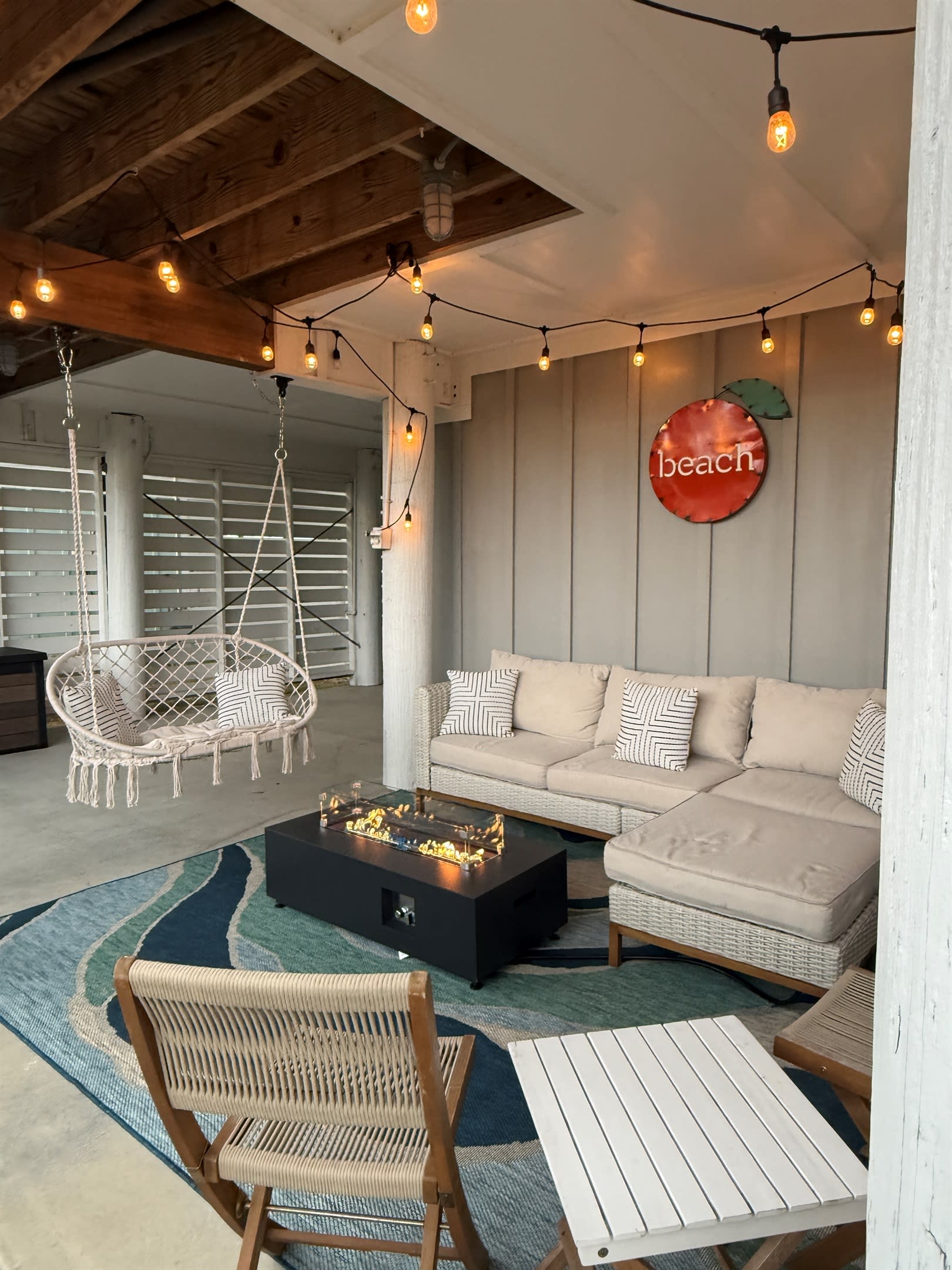 The patio area is made for relaxing with your family and friends, with a luxurious sofa with chaise lounge, a comfortable hammock swing, and a wonderful firepit for those cooler evenings.  You’ll want to spend all your time here!!