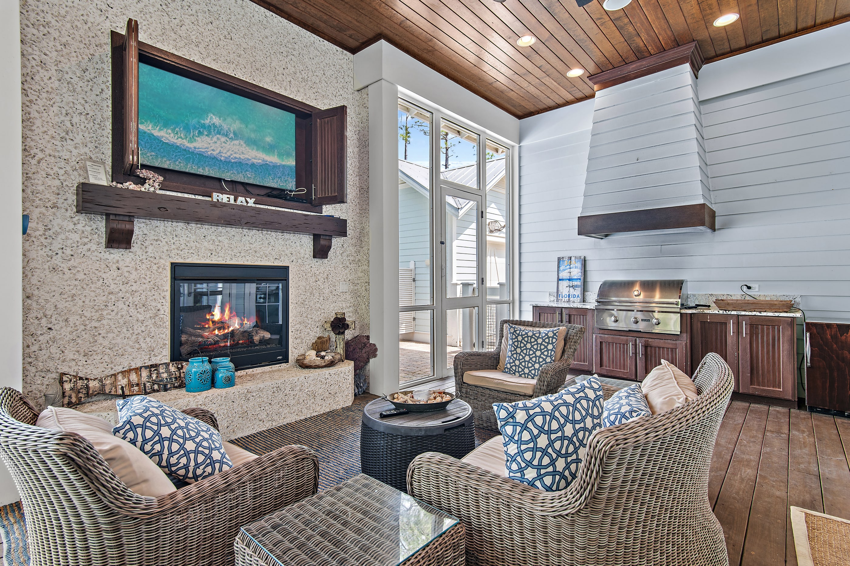 Grill burgers and watch the game in this great indoor/outdoor area