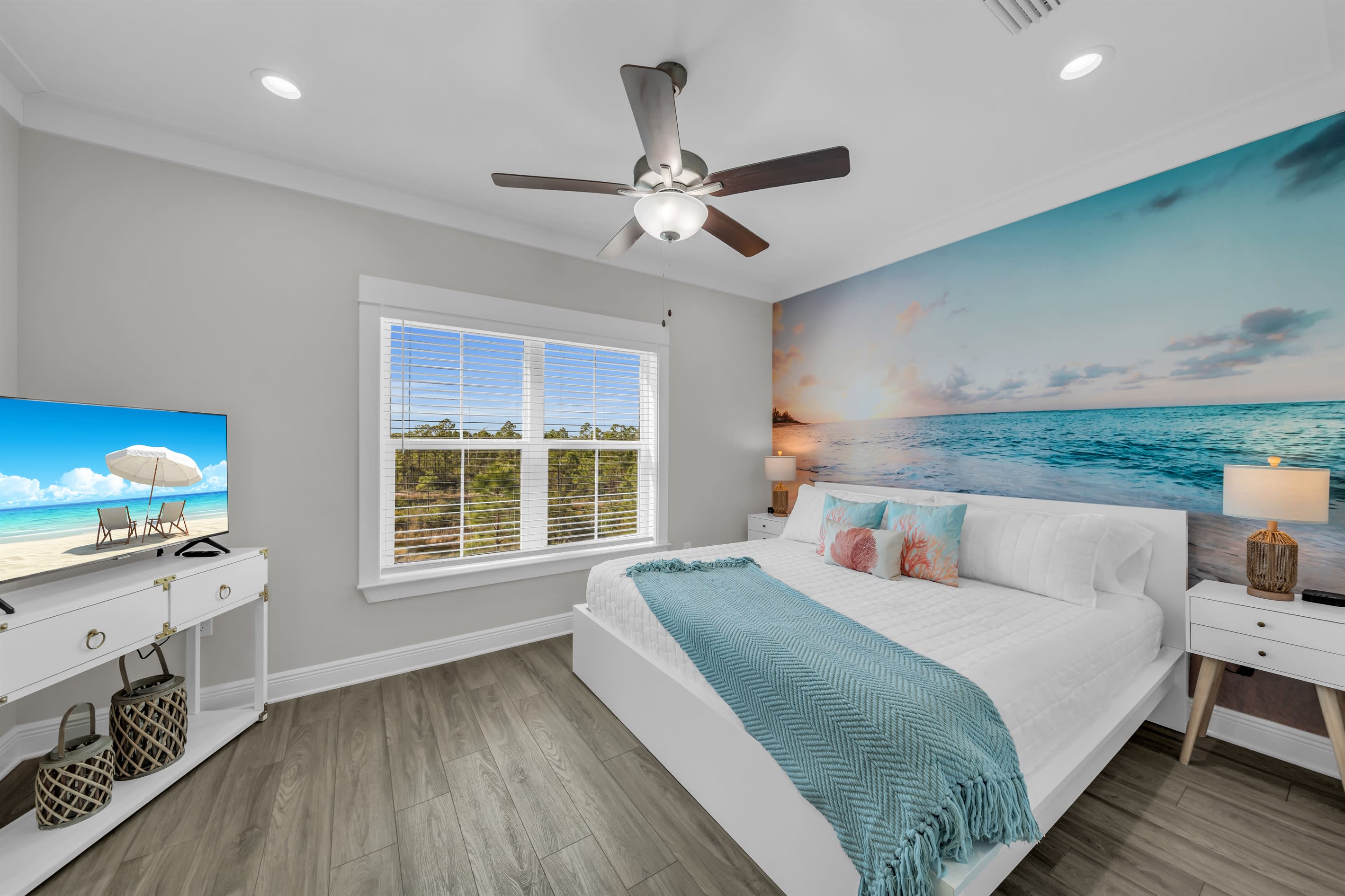 The Primary Bedroom has a KING Size bed and 4 king size pillows for you to get a great nights sleep, while the ceiling fan provides a cool breeze and the white-noise machine provides the relaxing backdrop.  The room overlooks the wetlands behind the house