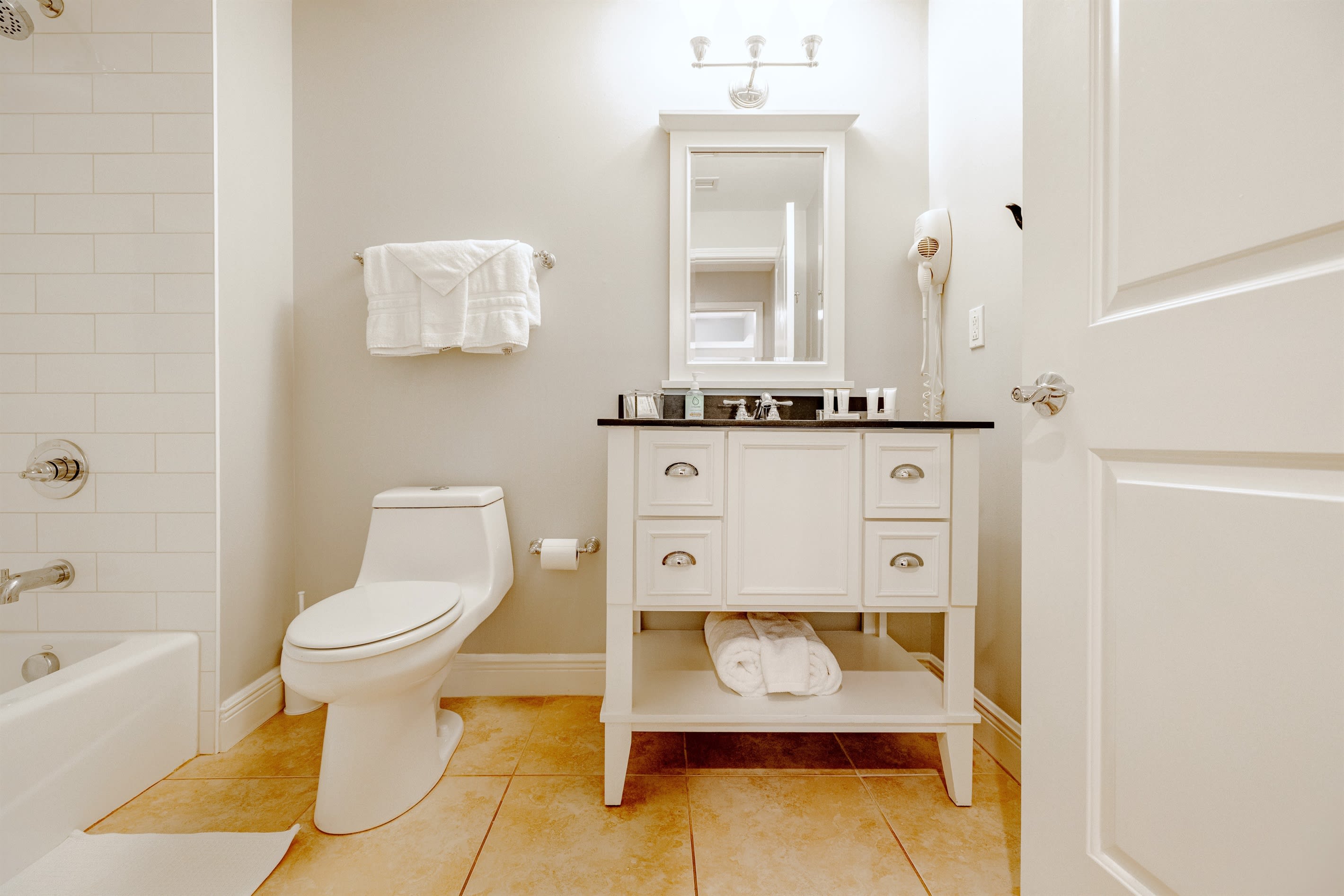 Second Master Bath features remodelled shower with niche.