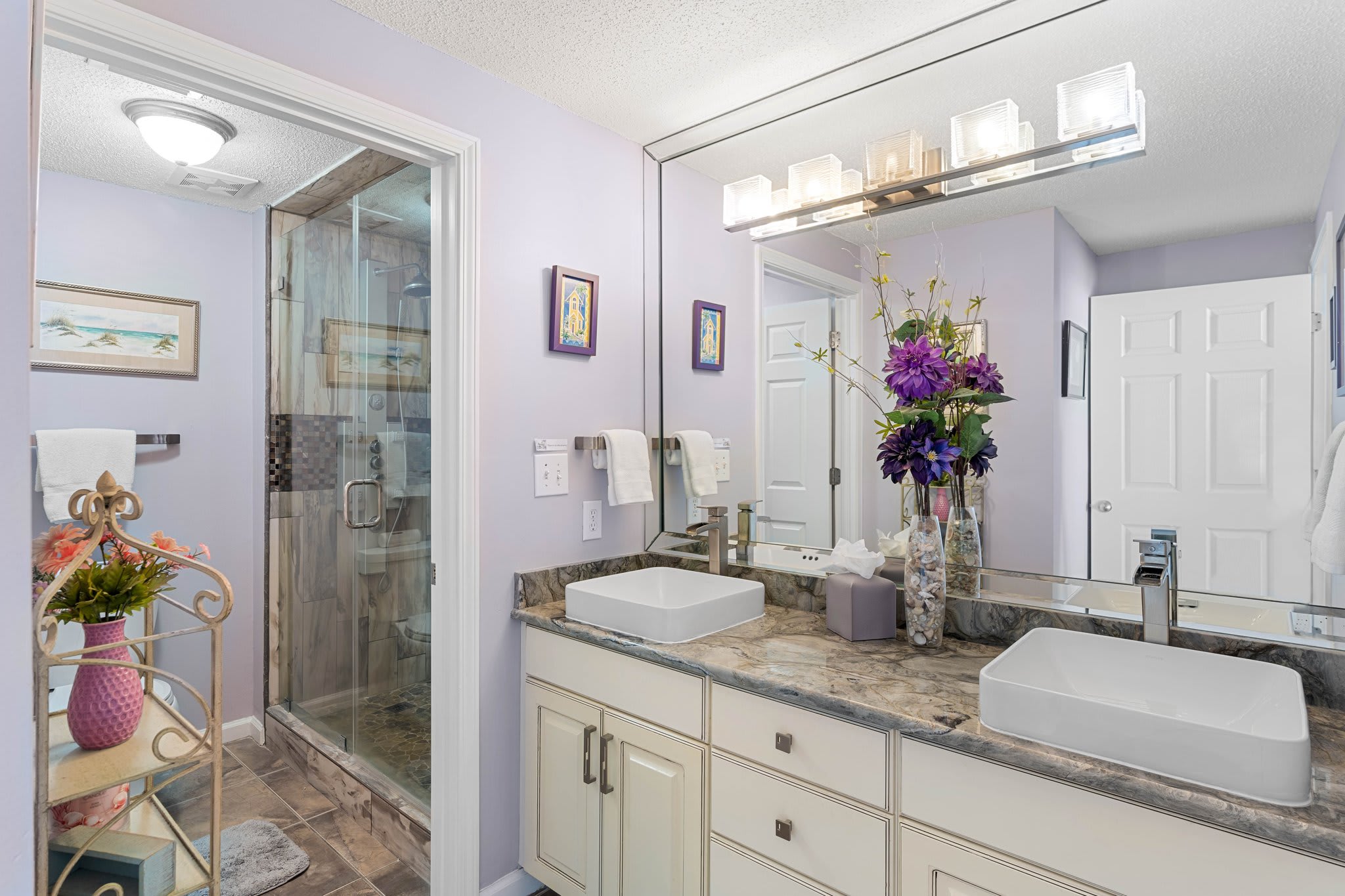 Bathroom vanity w/ large mirror, clean lines & simple coastal style. Bathroom vanity w/ large mirror, clean lines & simple coastal style.