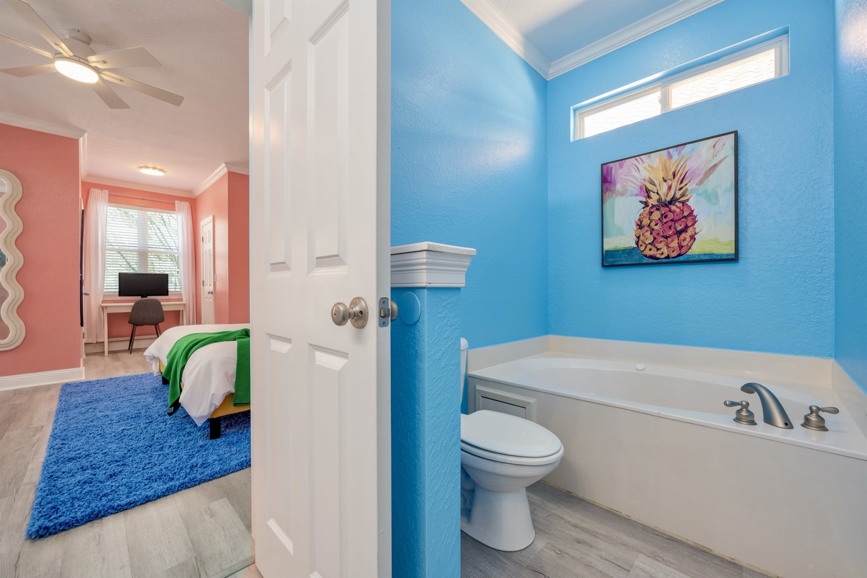 Master bath. Office workspace seen in the distance.