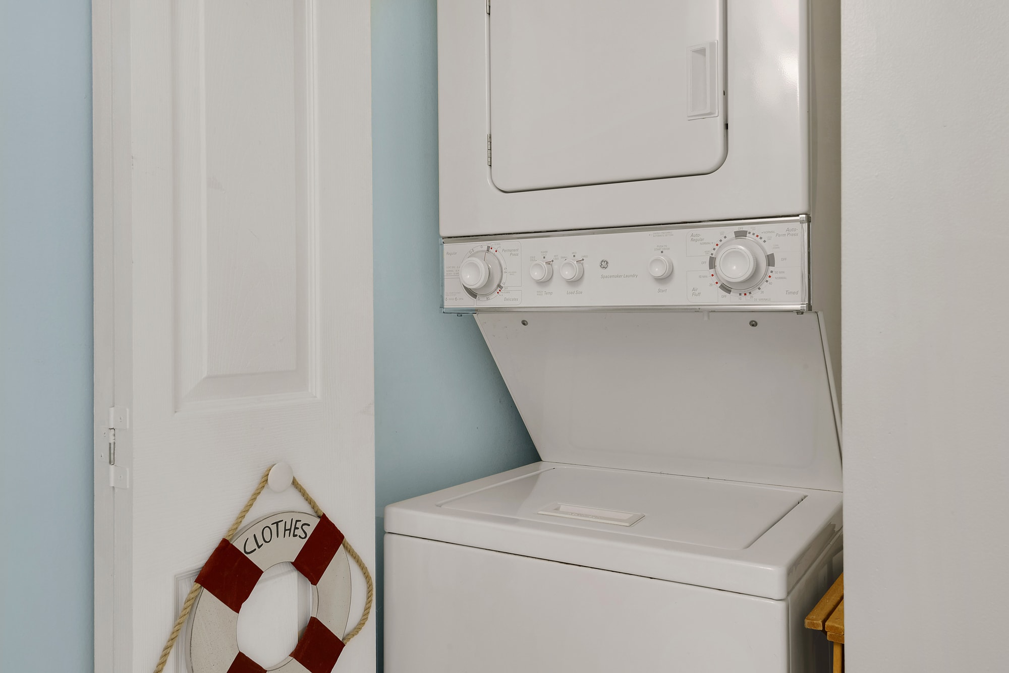stackable washer/dryer in the unit located in closet in the guest bathroom